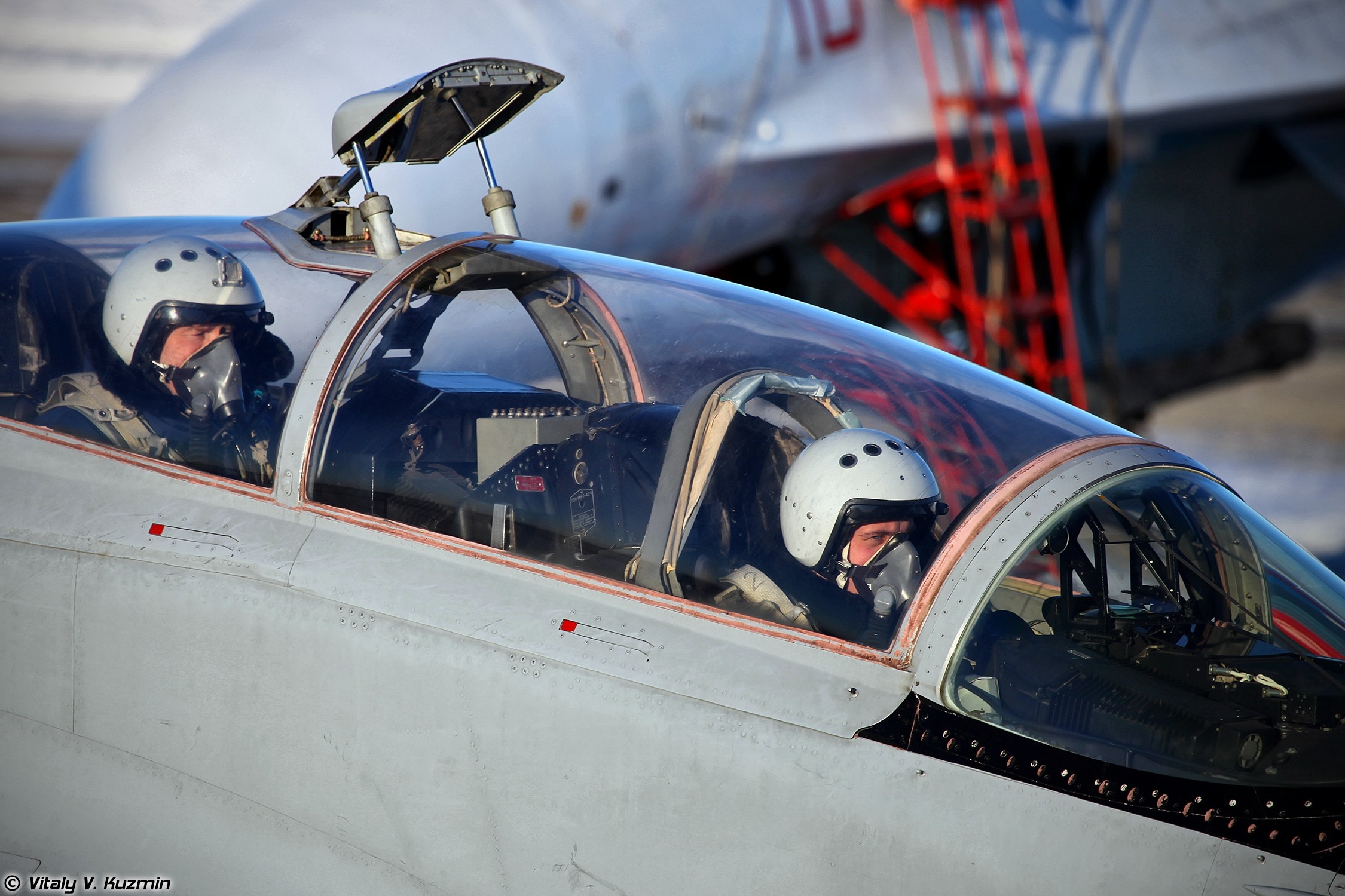 Two pilots in a fighter jet cockpit HD Wallpaper