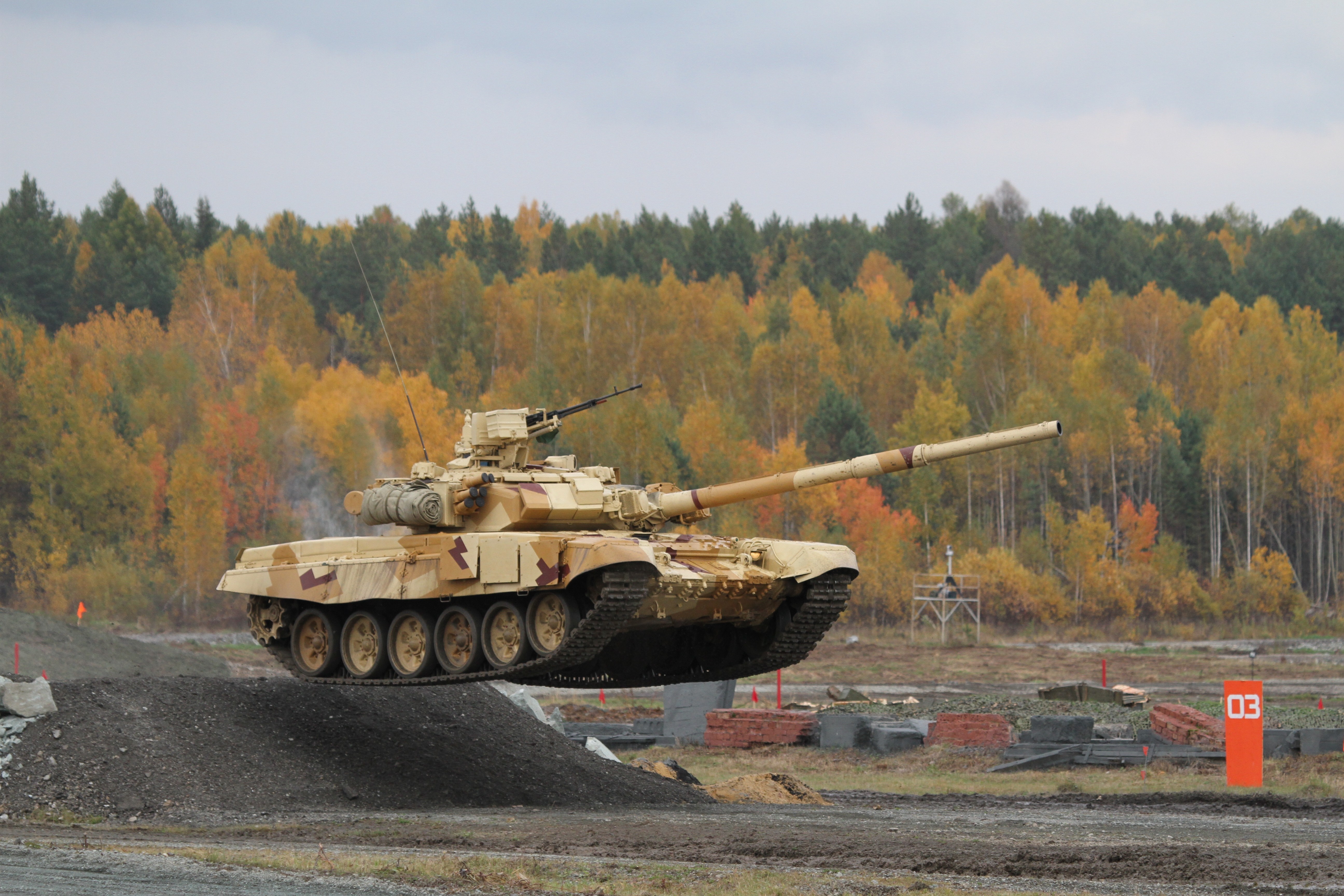 T-90 tank jumping over an obstacle HD Wallpaper