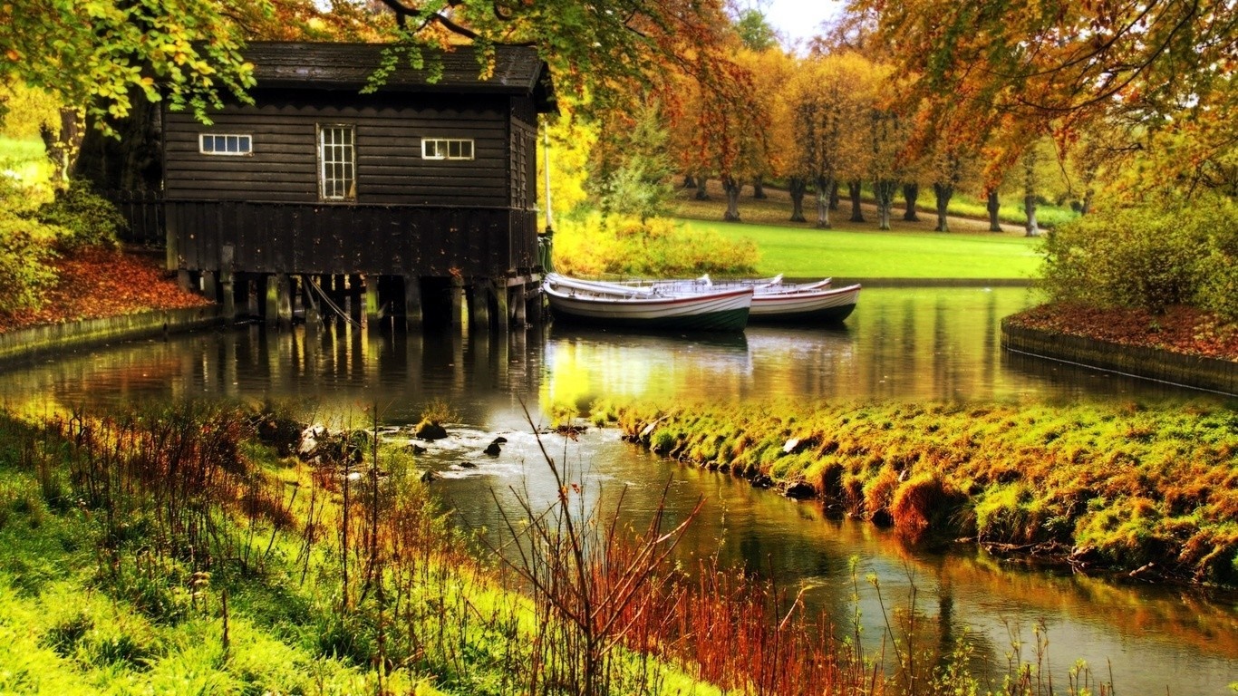 Autumn scene with boathouse and boats on a creek HD Wallpaper
