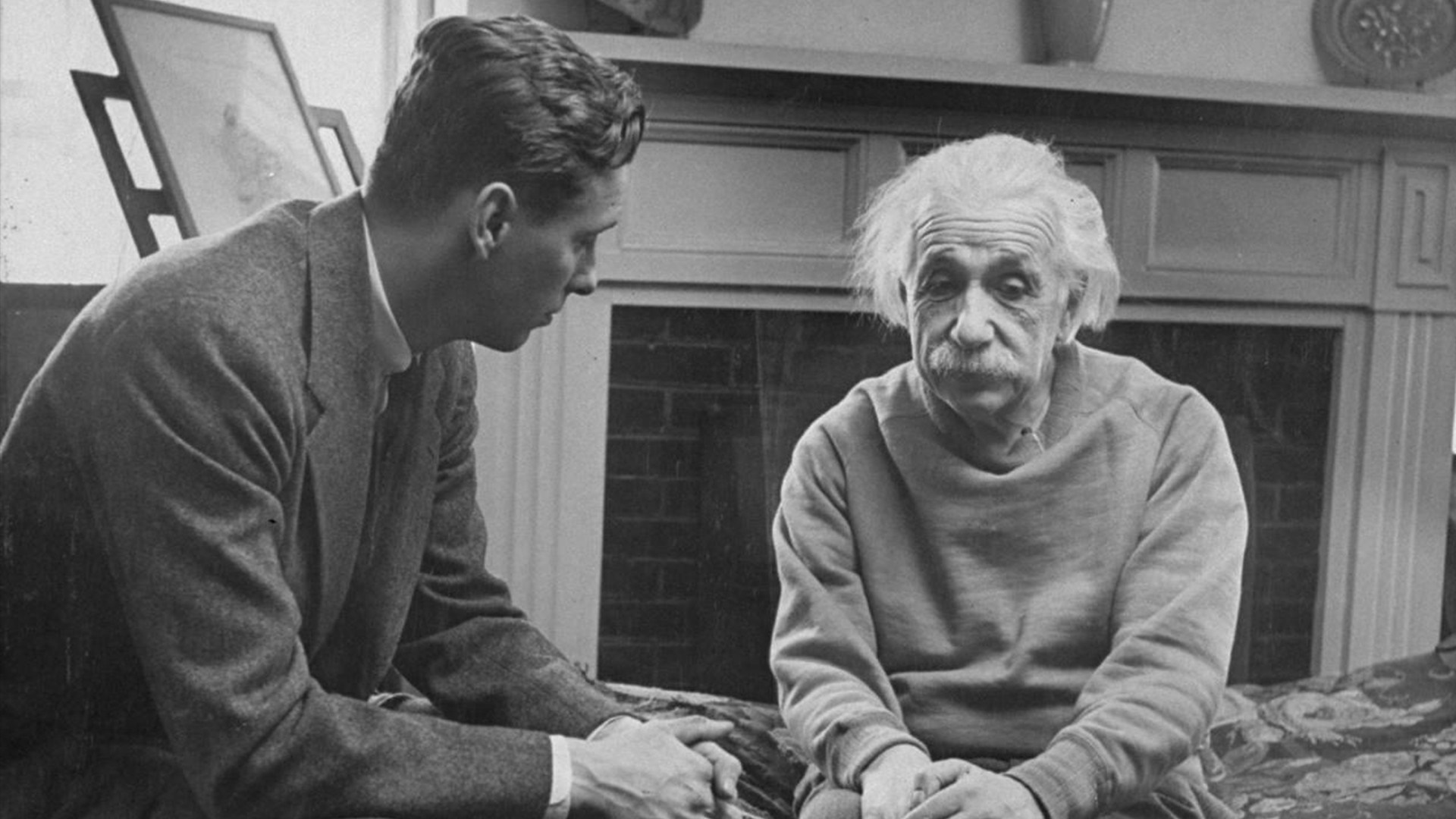 Albert Einstein and a man in conversation HD Wallpaper