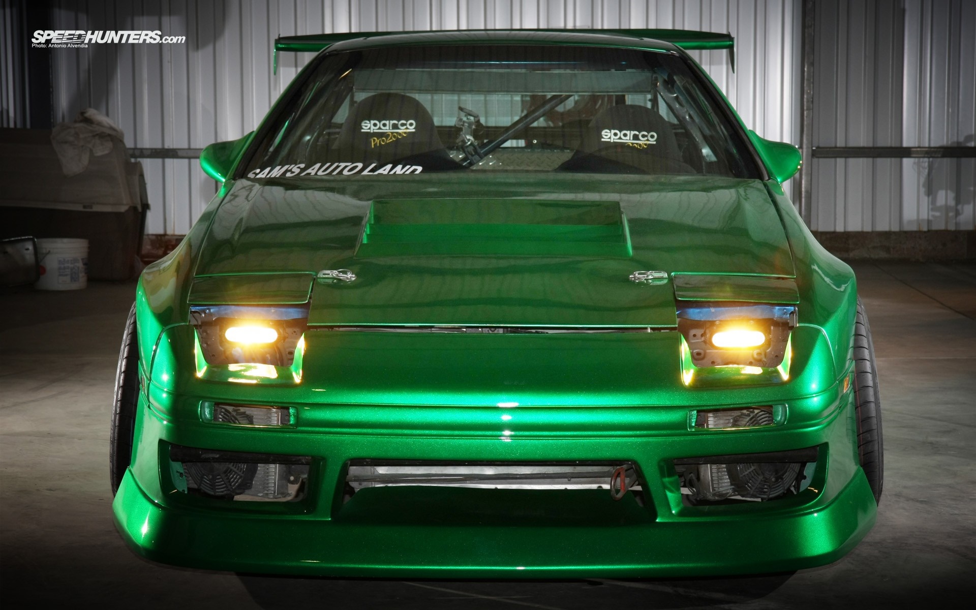 Green Mazda RX-7 with racing seats and custom body kit HD Wallpaper