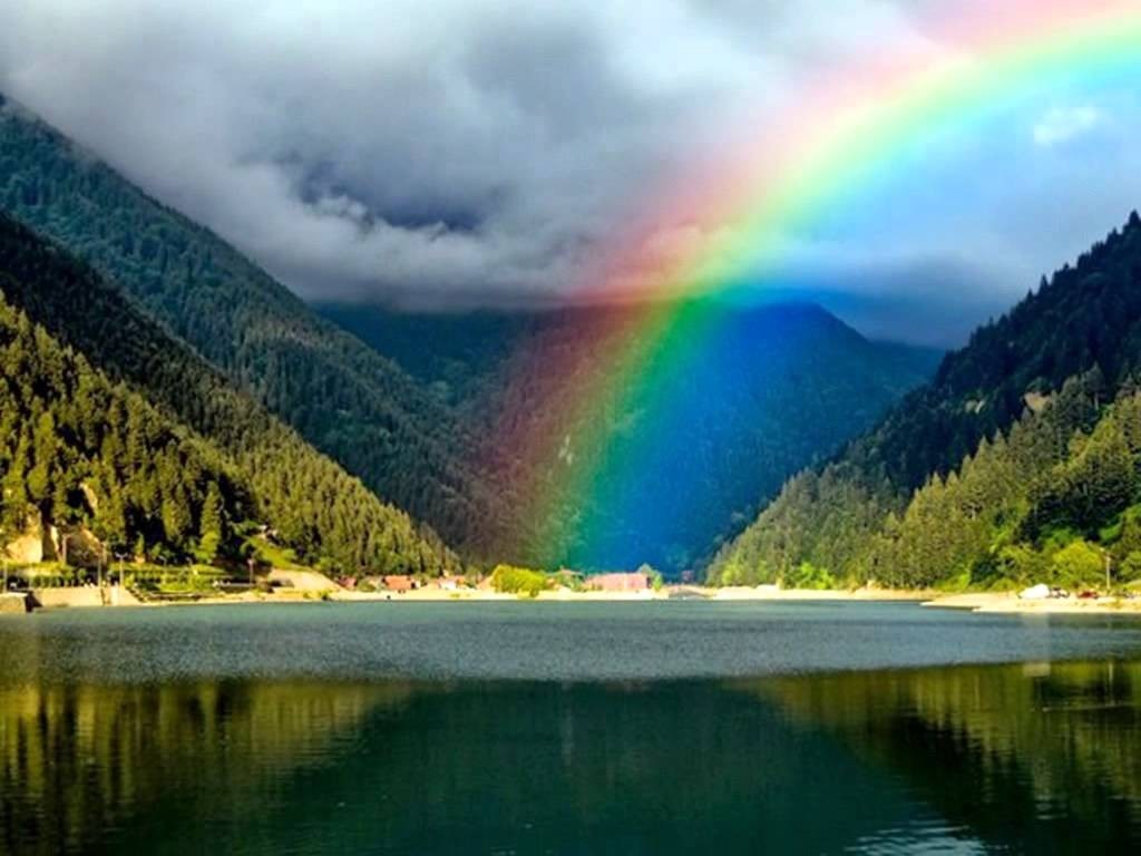 Rainbow over a lake and mountains HD Wallpaper