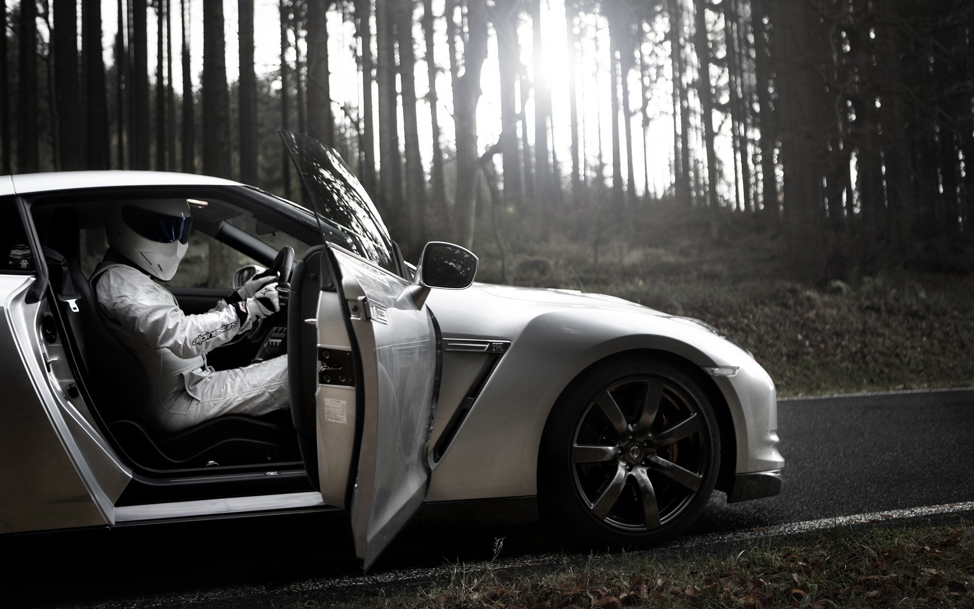 The Stig in a Nissan GT-R in a forest HD Wallpaper