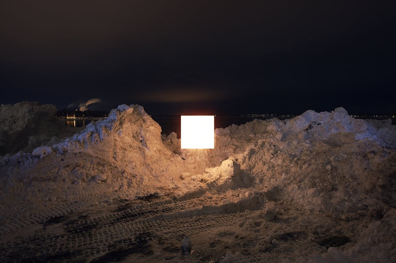 Glowing square in snowy landscape at night HD Wallpaper