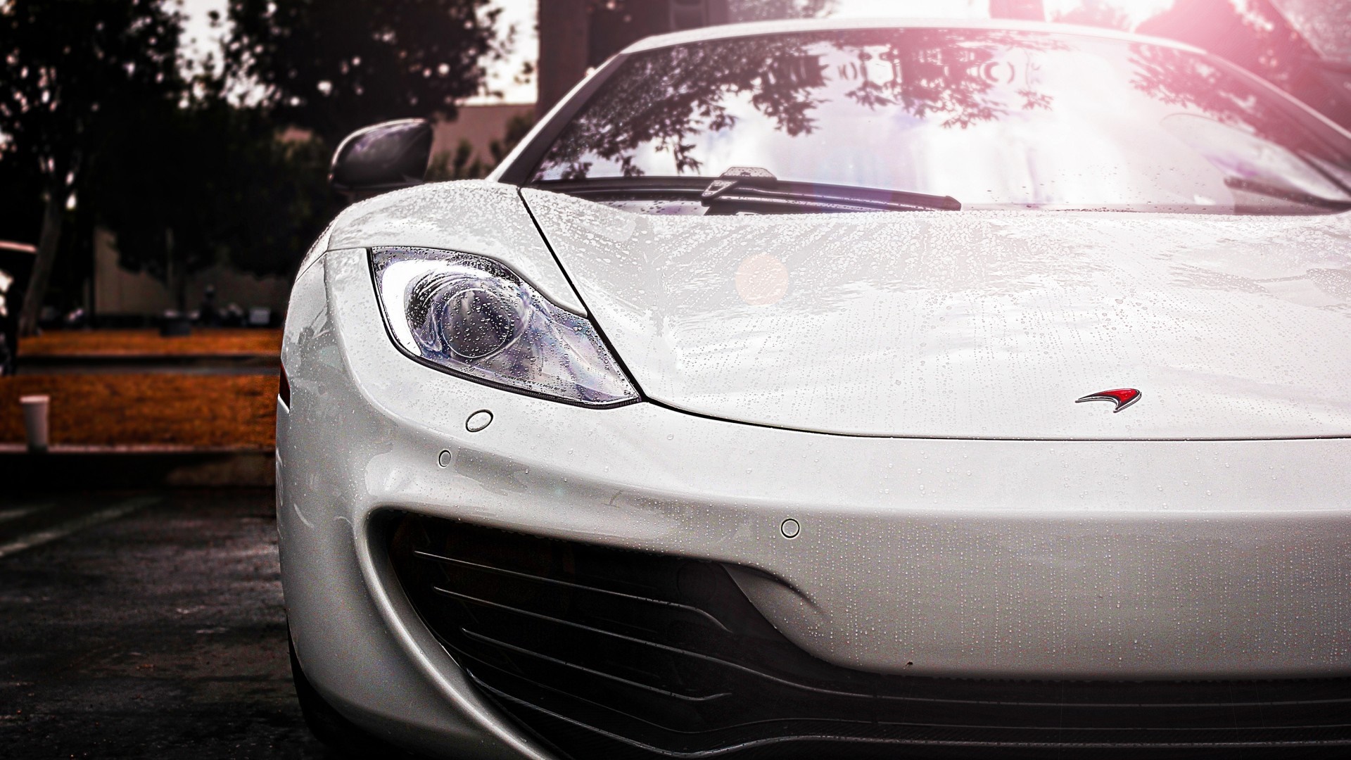 White McLaren MP4 12C sports car with water droplets HD Wallpaper