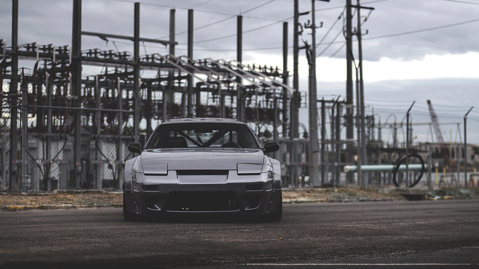 Nissan 240SX sports car in front of power station HD Wallpaper