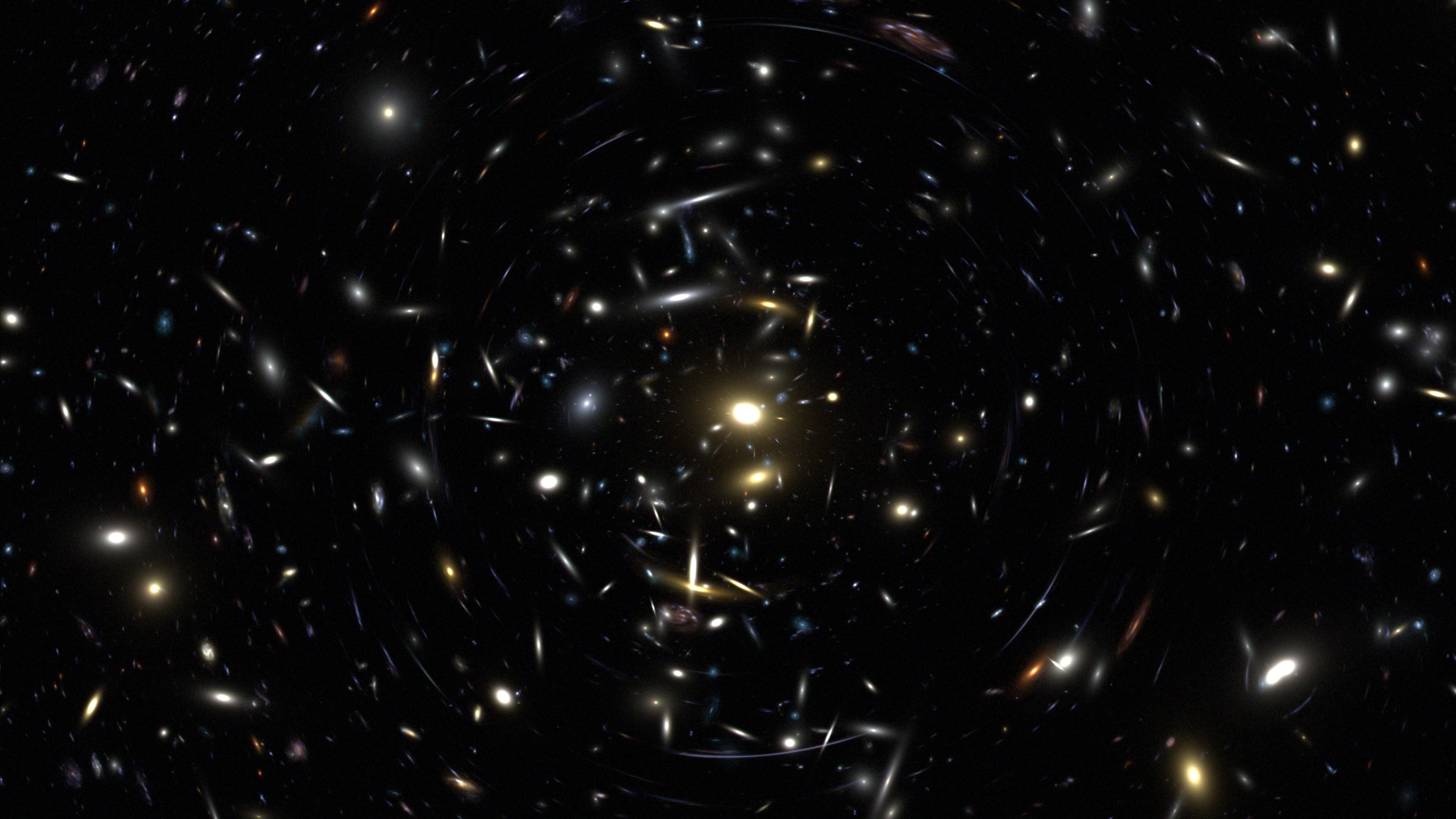 Deep space view of distant galaxies HD Wallpaper