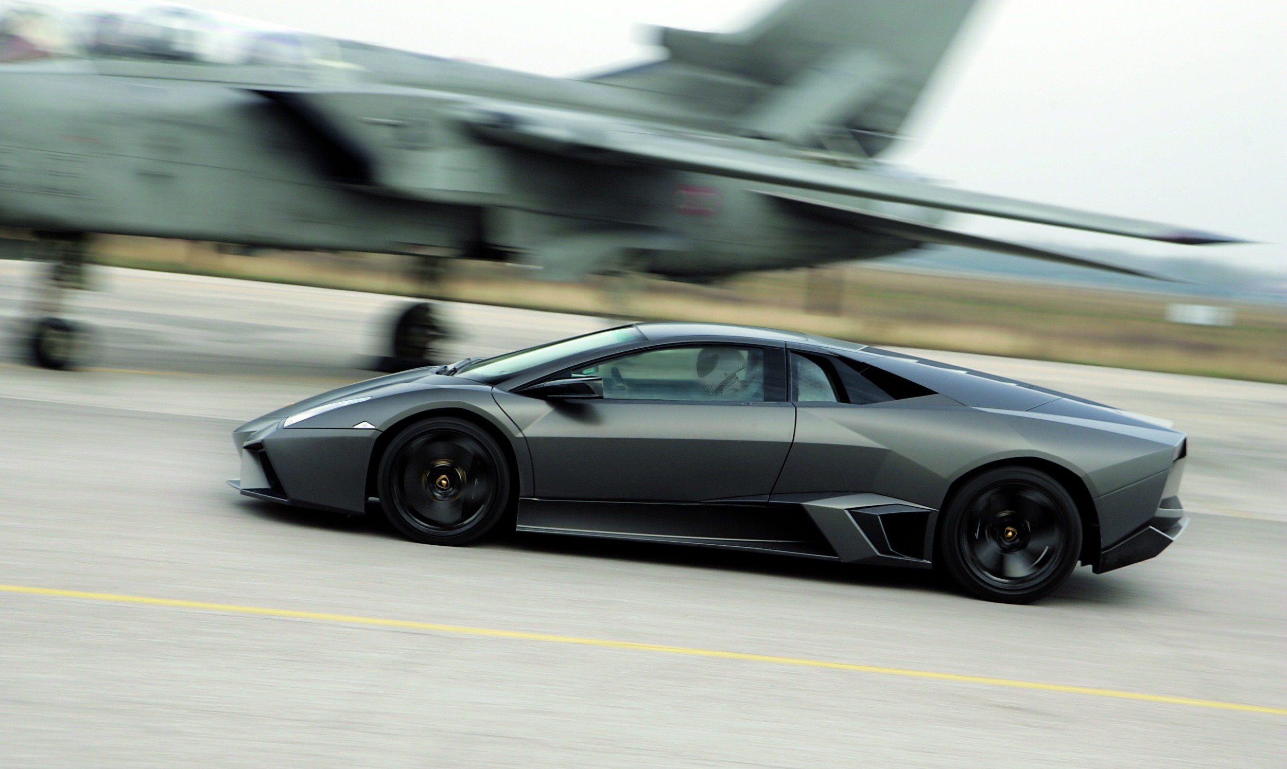 Lamborghini Reventon and Jet Fighter on Tarmac HD Wallpaper