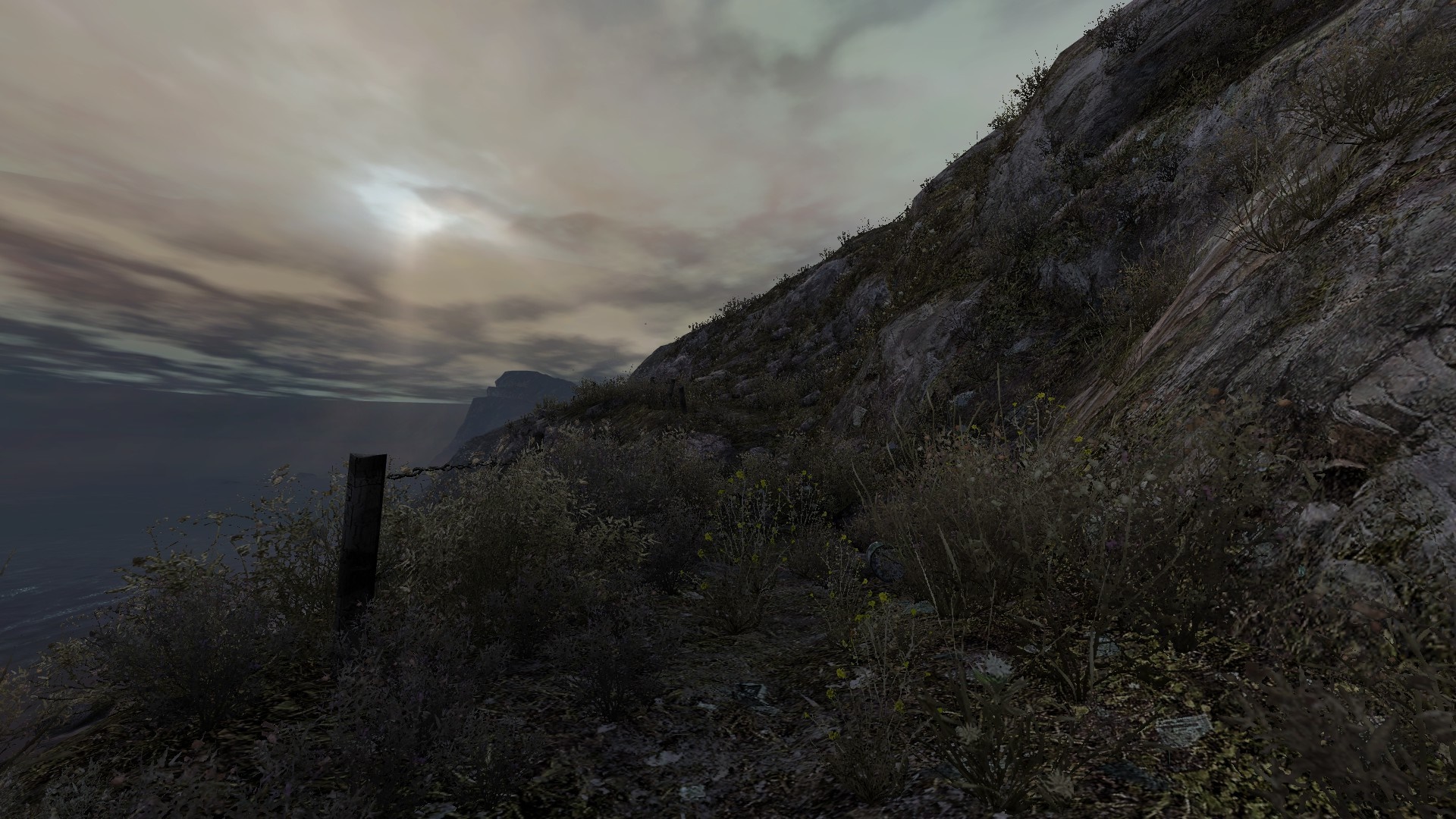 Dear Esther: A desolate cliffside overlooking the sea under a cloudy sky HD Wallpaper