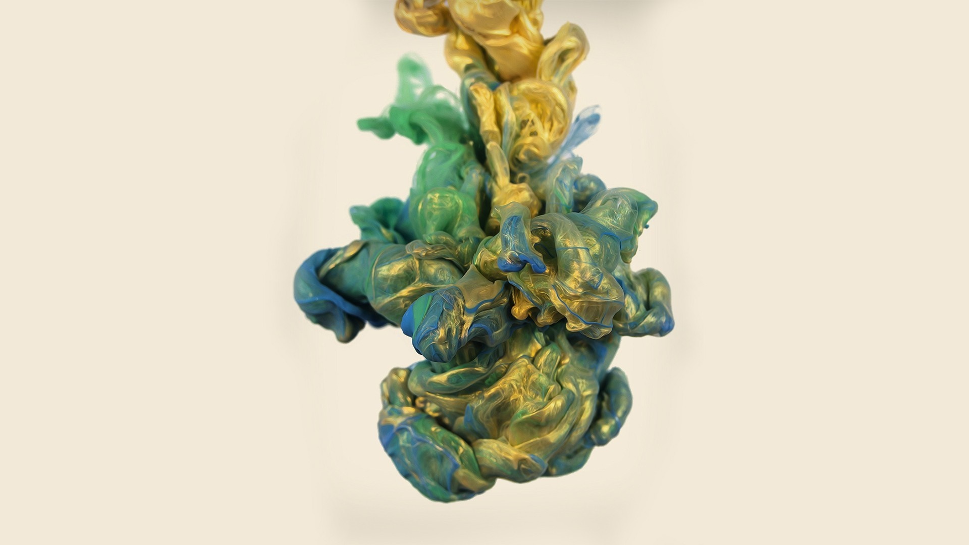 Gold and green ink swirling in water HD Wallpaper