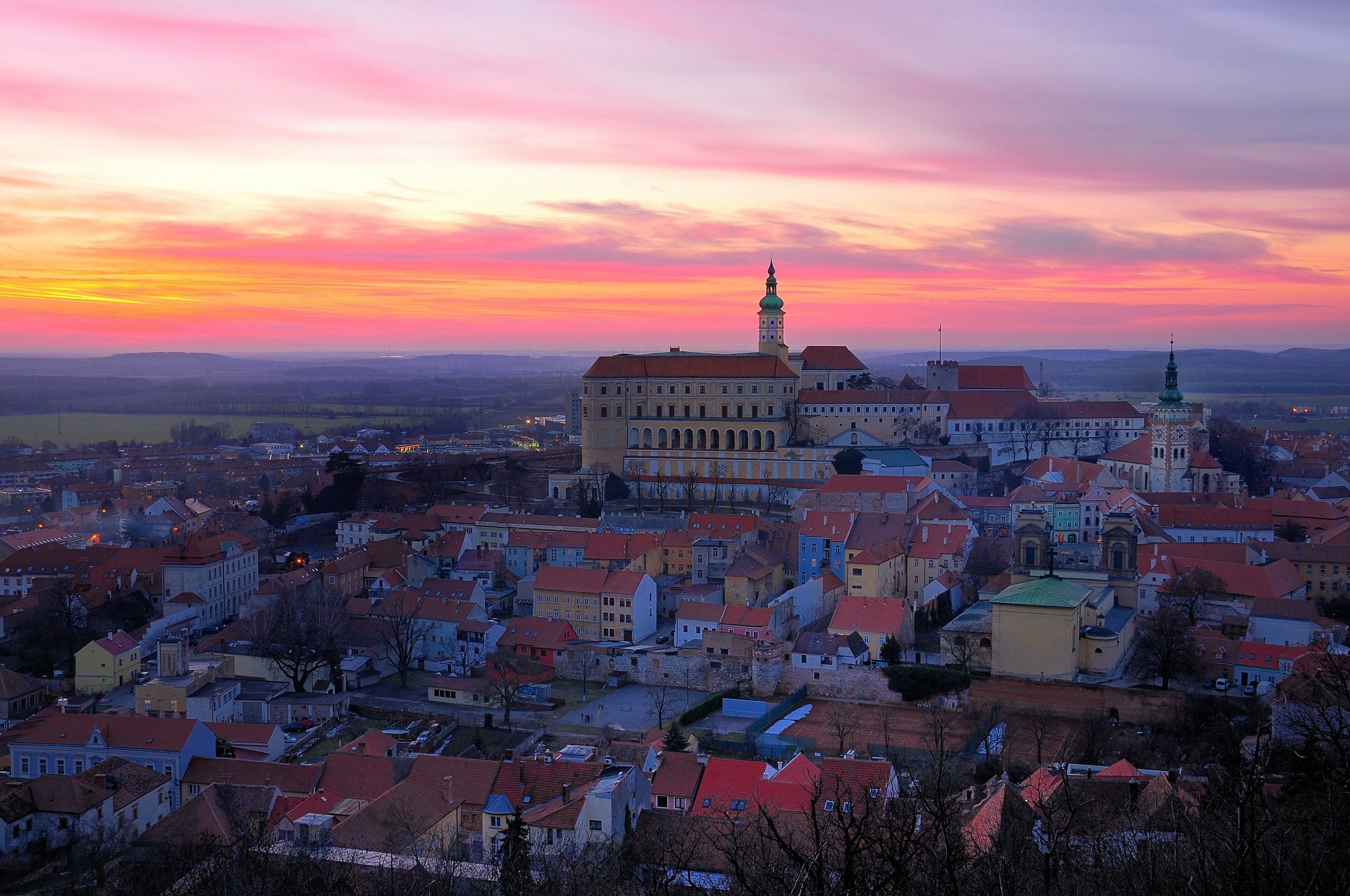 Cityscape with castle at sunset HD Wallpaper