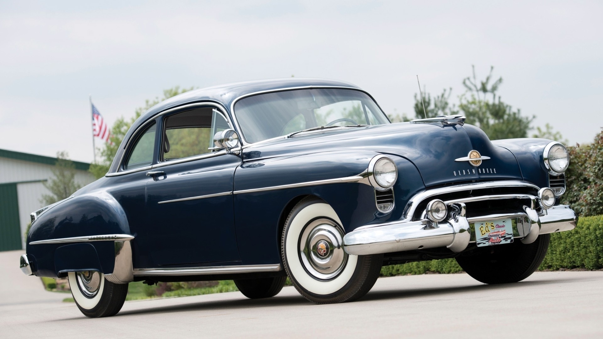Dark Blue 1950s Oldsmobile Sedan with Whitewall Tires HD Wallpaper