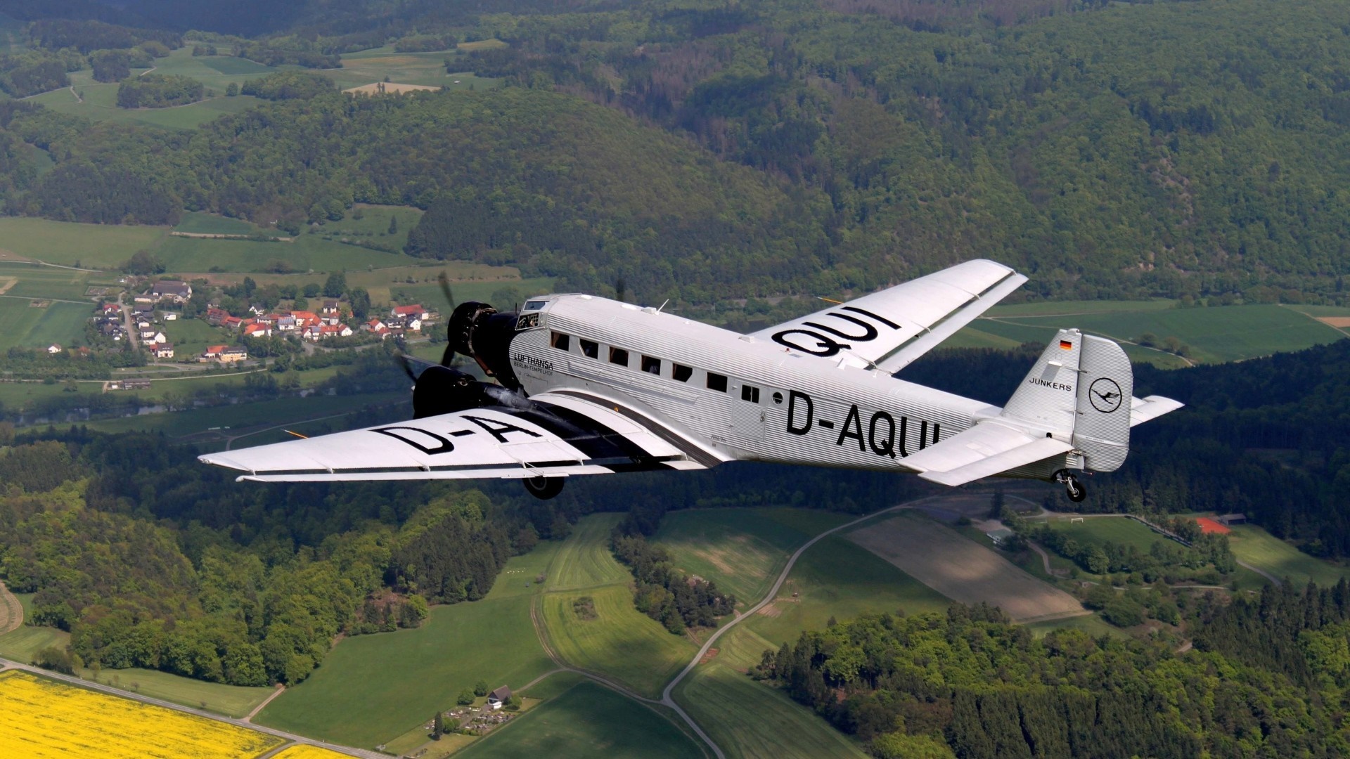 Lufthansa Junkers Ju 52 3m airplane flying over landscape HD Wallpaper