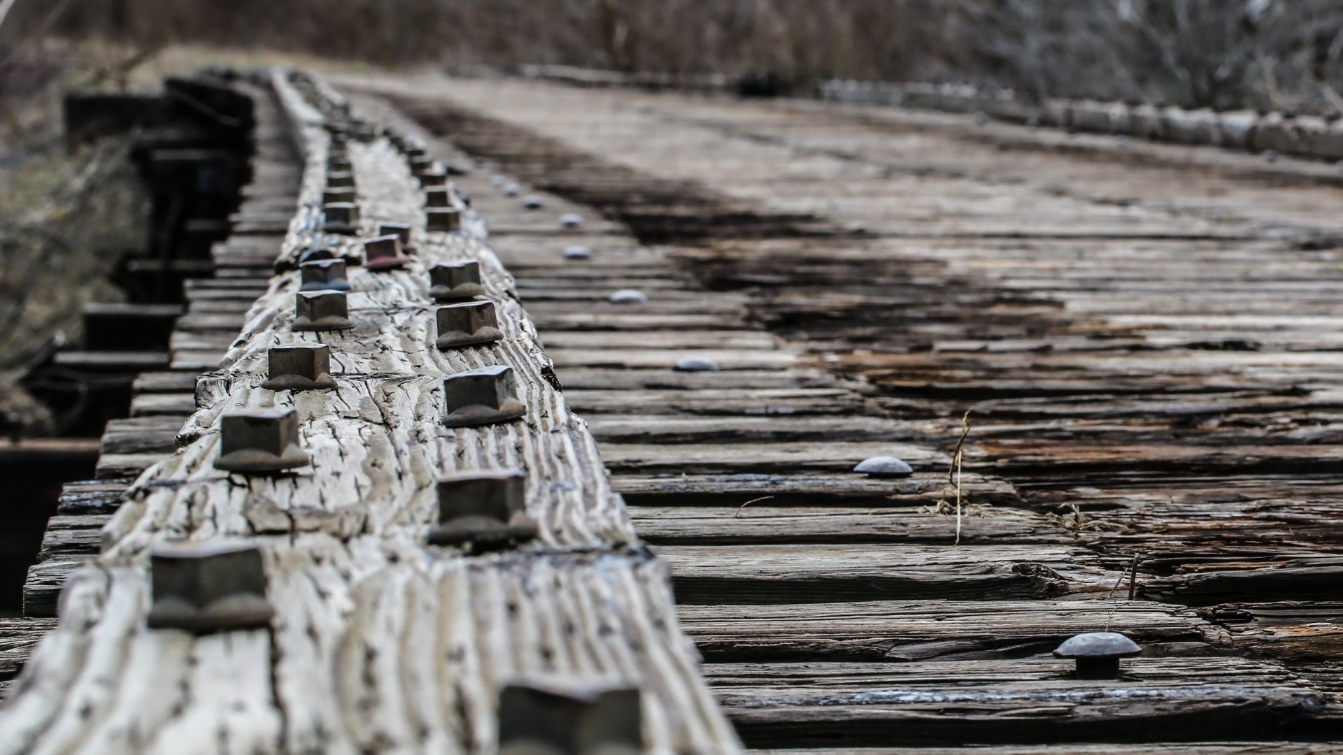 Old wooden bridge with rusted bolts HD Wallpaper