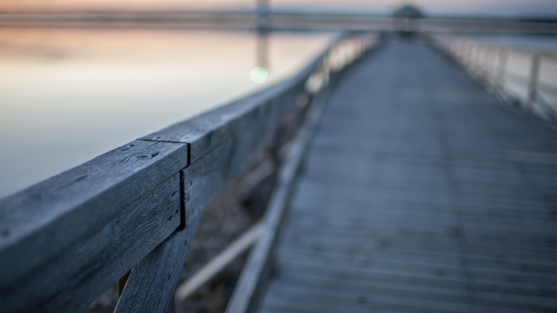 Wooden pier over water at sunrise HD Wallpaper