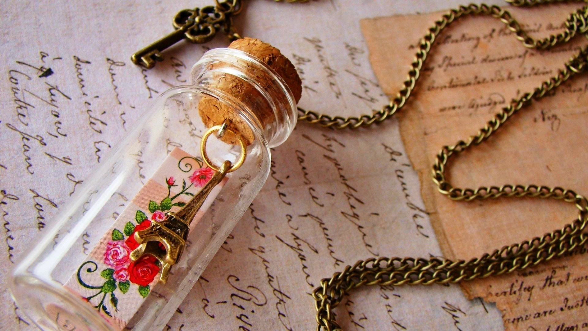 Necklace with Eiffel Tower charm in a bottle HD Wallpaper