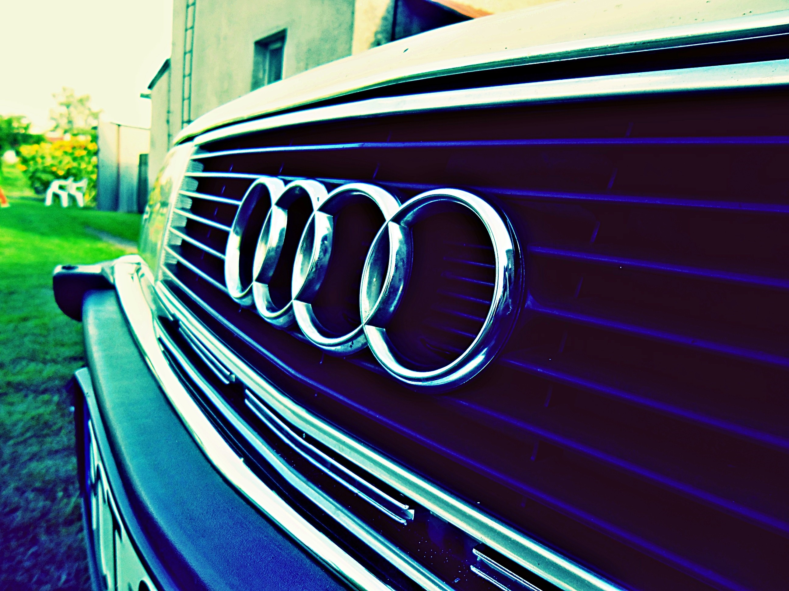 Audi car grille with four rings logo HD Wallpaper