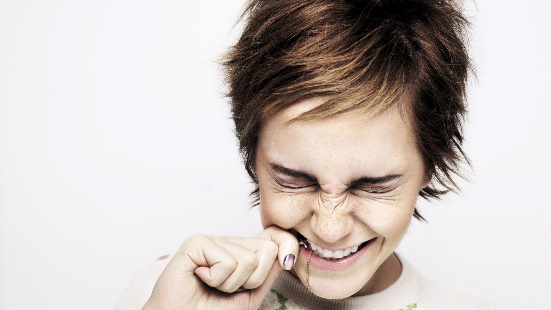 Emma Watson with hand on face HD Wallpaper