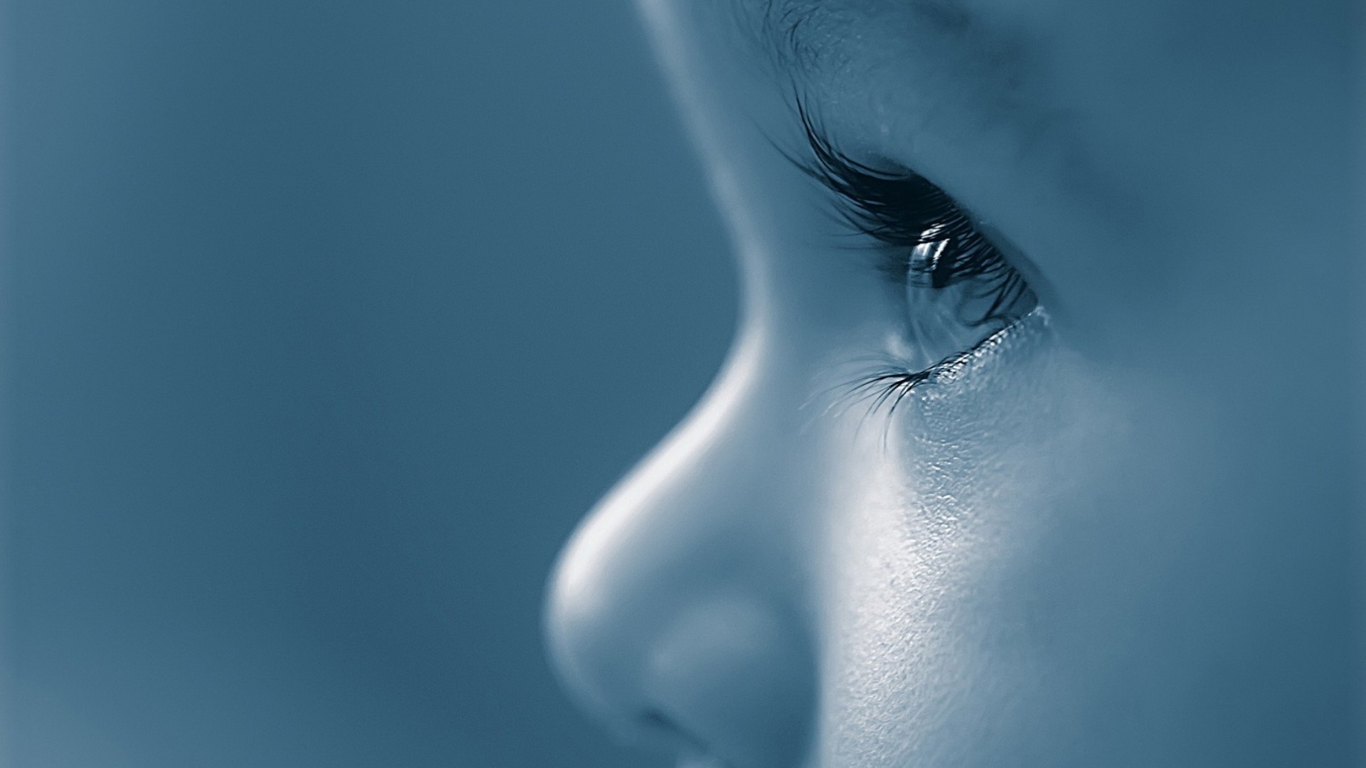 Close-up of a baby's eye and nose HD Wallpaper