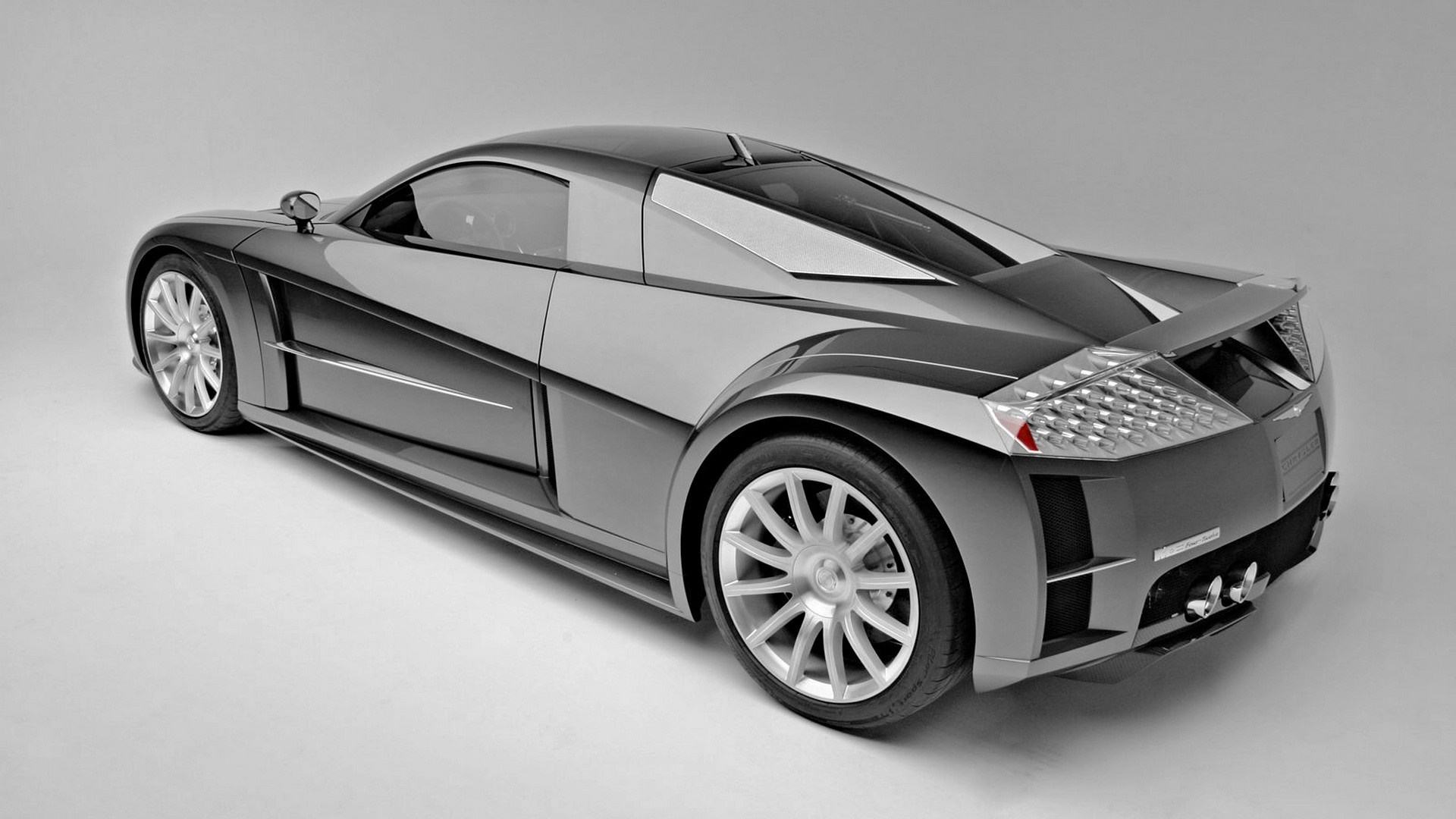 Rear three-quarter view of a concept sports car HD Wallpaper