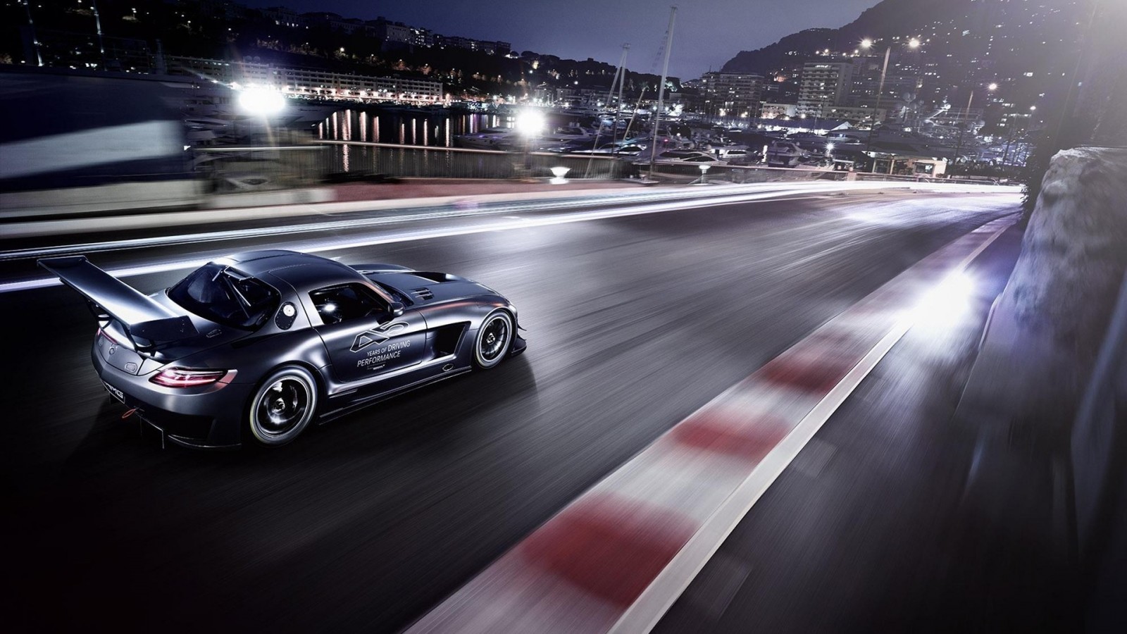 Mercedes-Benz SLS AMG Black Series on a race track at night HD Wallpaper