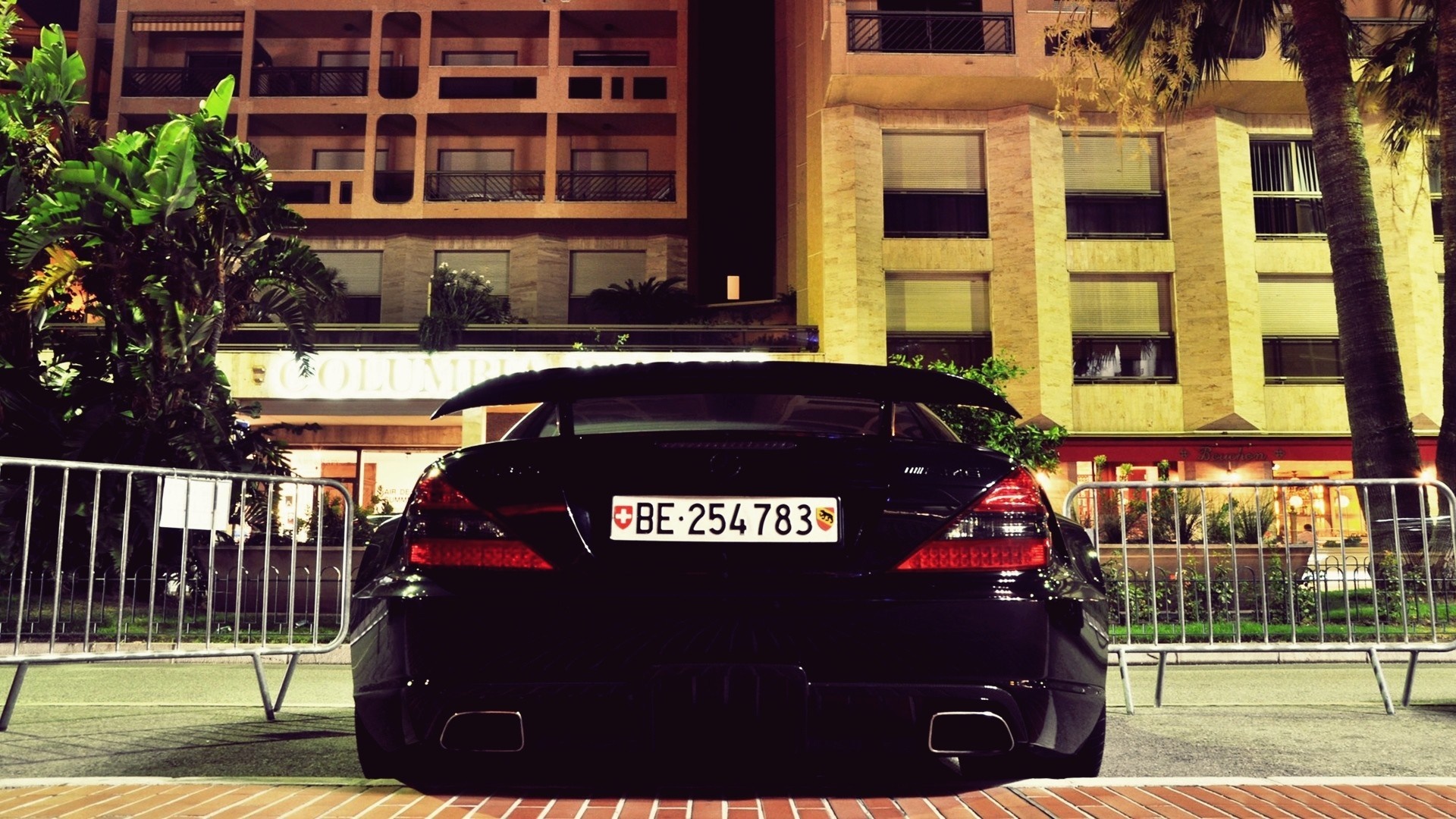 Black Mercedes-Benz SL with Swiss license plate at night HD Wallpaper