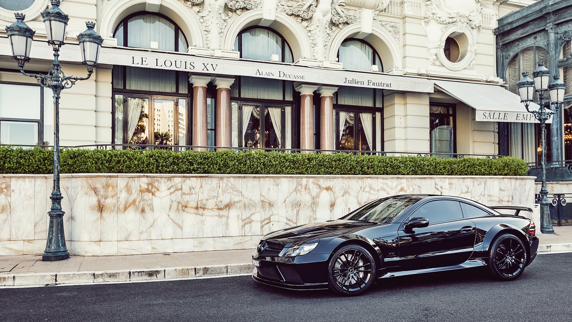 Black Mercedes-Benz SL-Class parked in front of Le Louis XV restaurant HD Wallpaper
