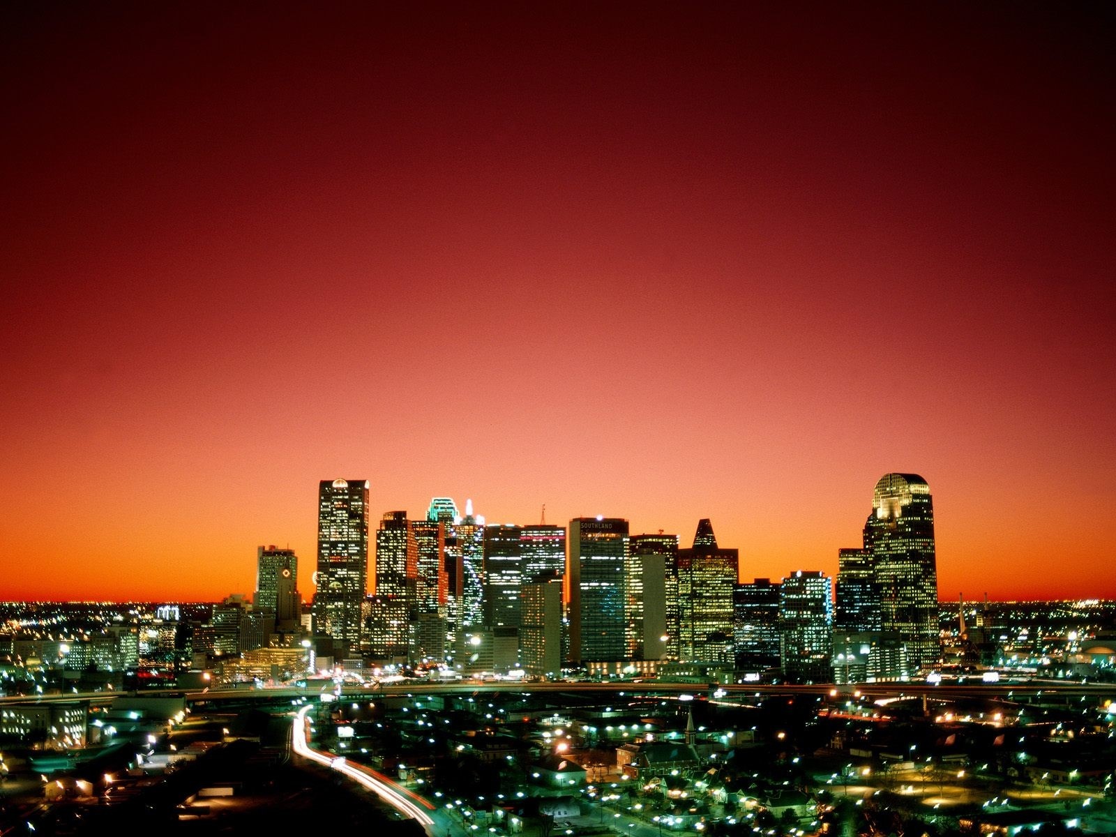 Dallas skyline at sunset with city lights HD Wallpaper