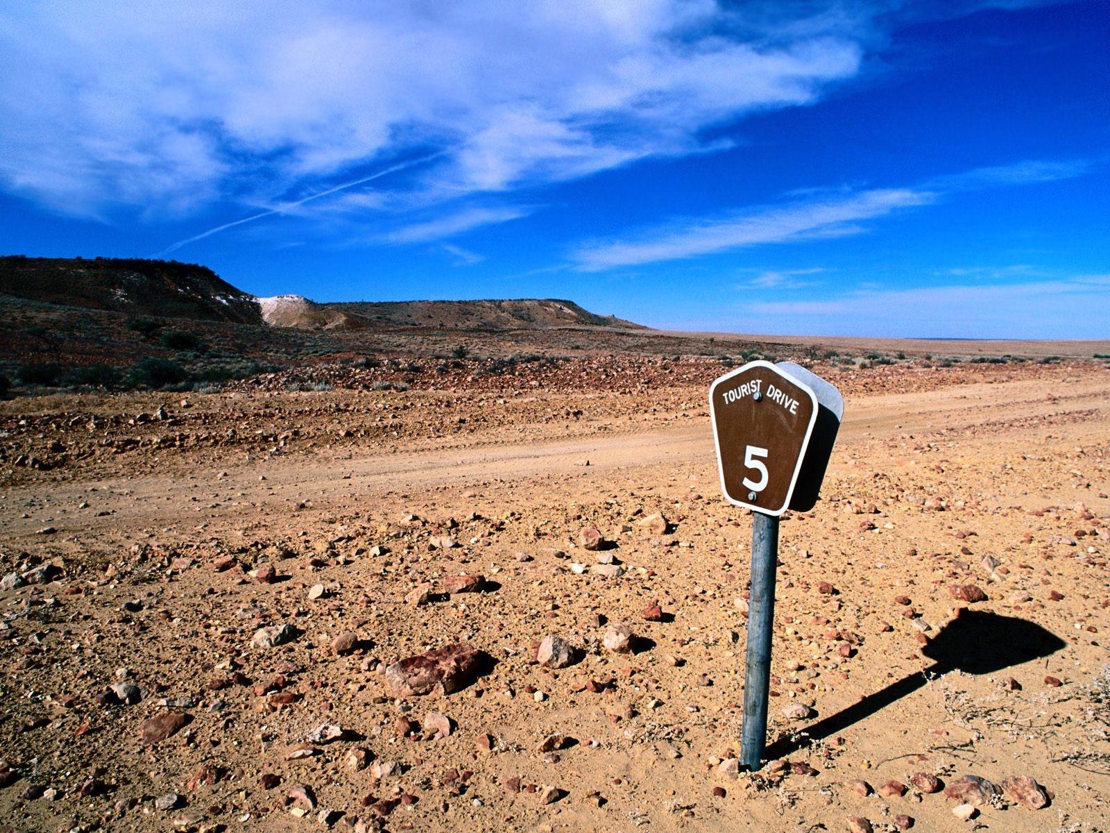 Tourist Drive sign in a desert landscape HD Wallpaper