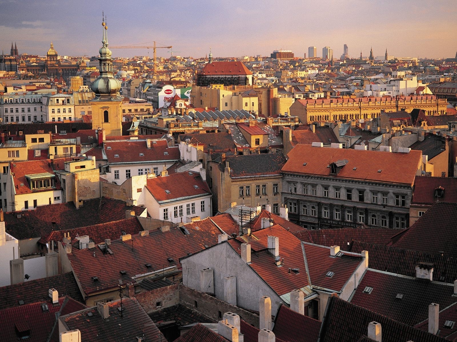 Prague cityscape at dusk with historic architecture HD Wallpaper