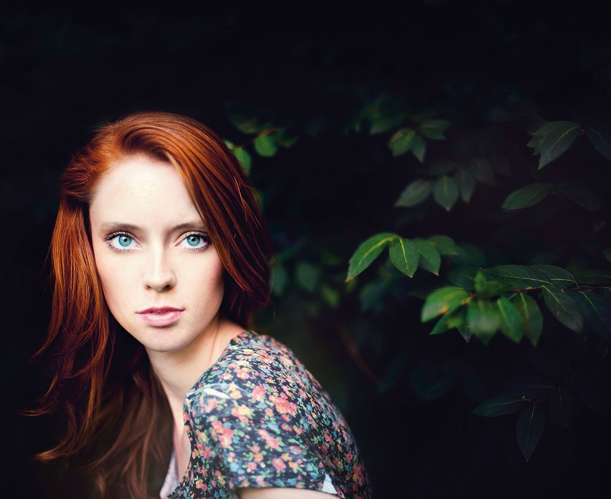 Redhead woman with blue eyes in floral shirt HD Wallpaper