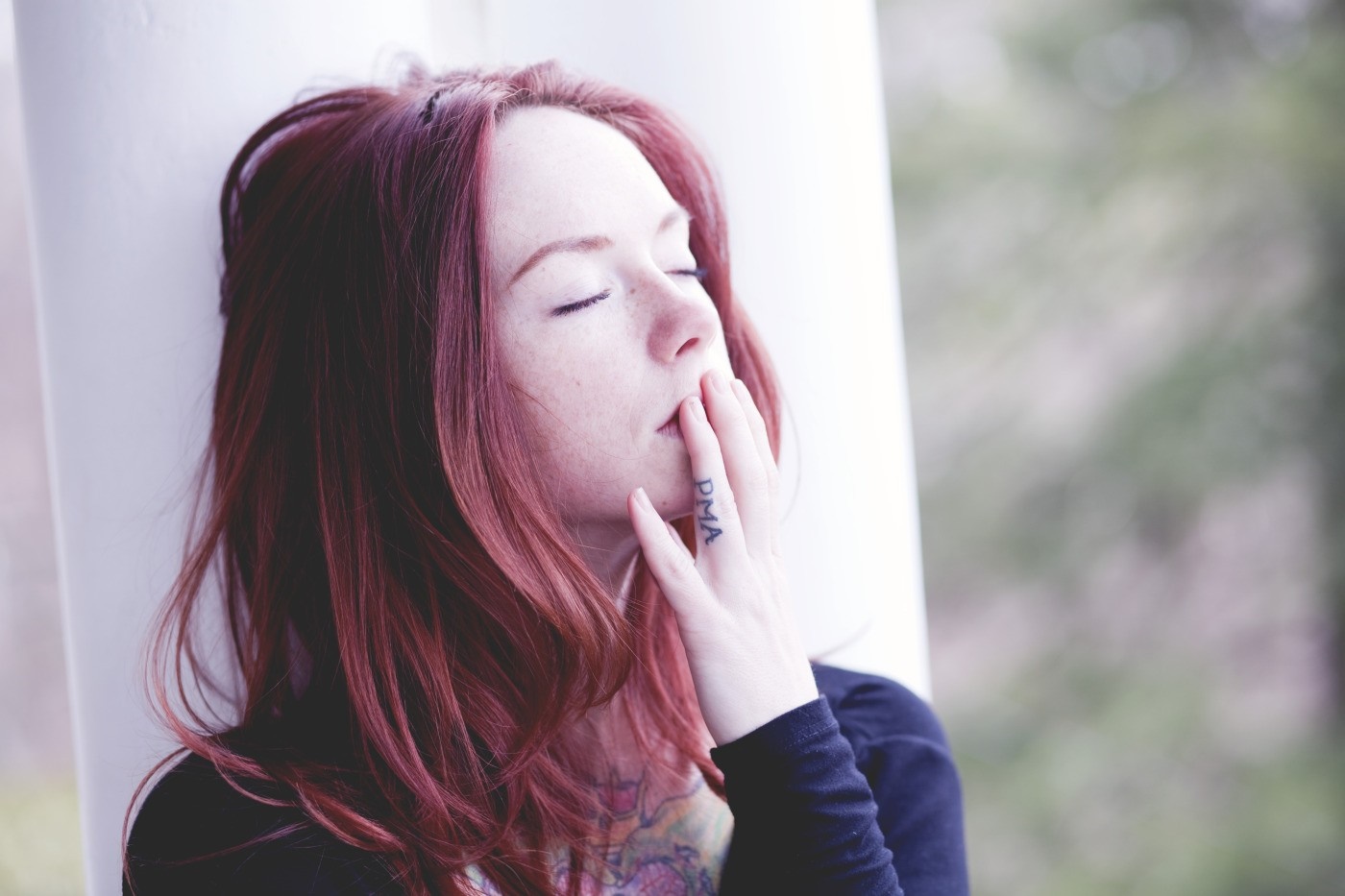 Woman with red hair and freckles, hand on mouth HD Wallpaper