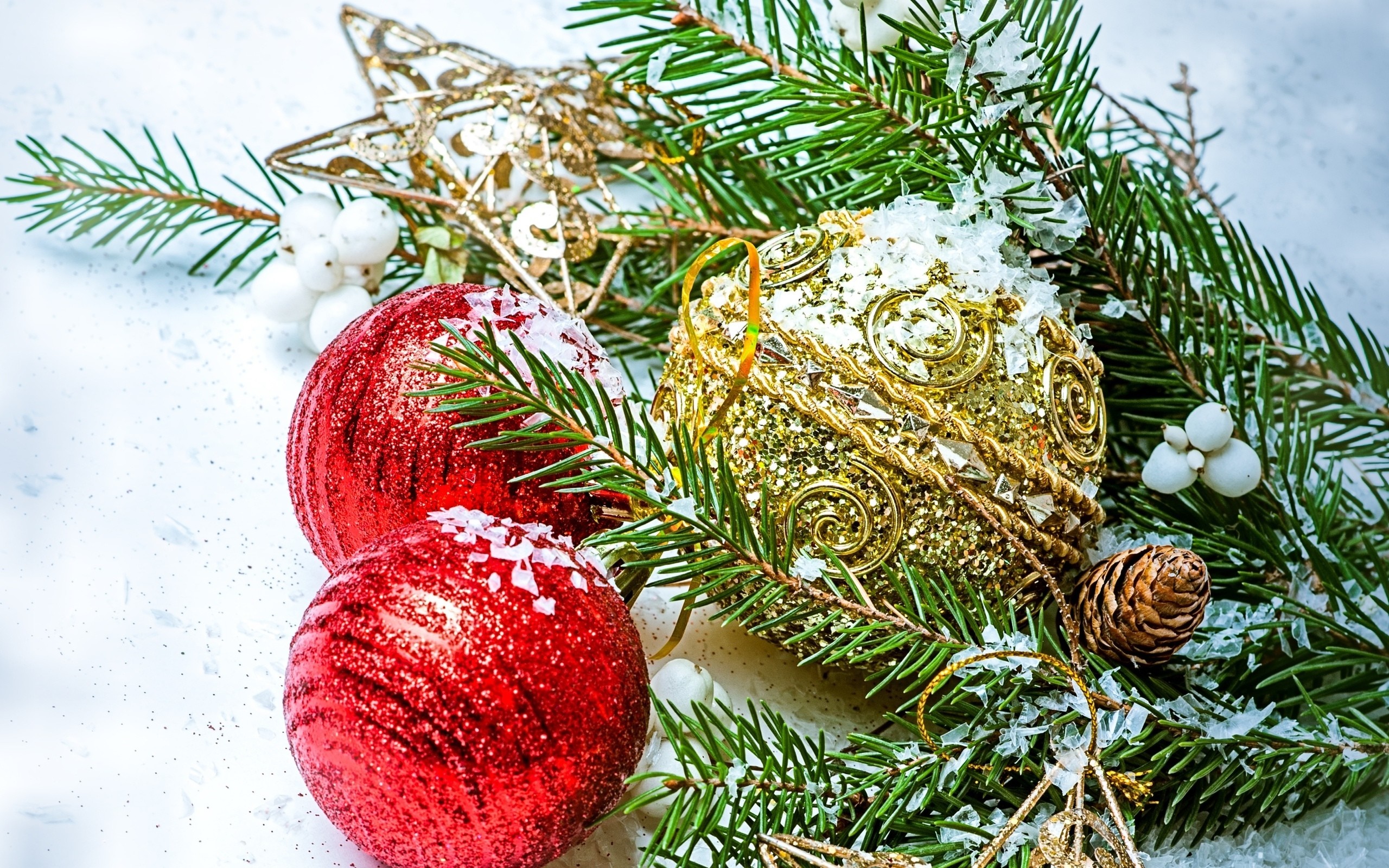 Christmas ornaments on spruce branches with snow HD Wallpaper