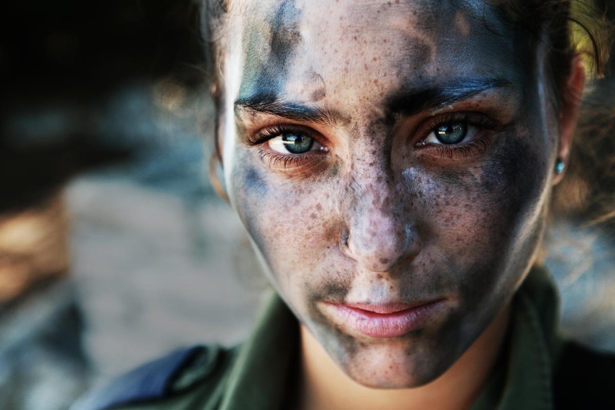 Woman with face paint in close-up portrait HD Wallpaper