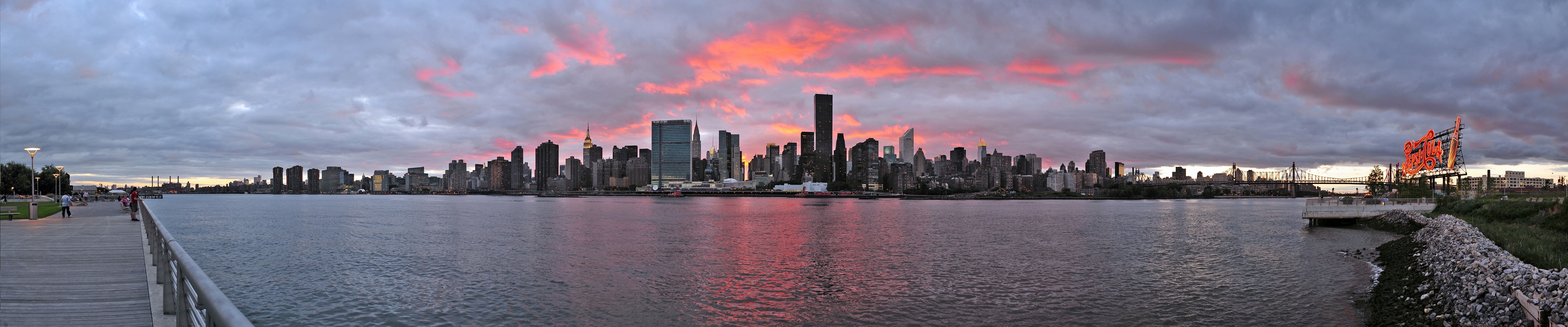 New York City skyline panorama at sunset over the water HD Wallpaper