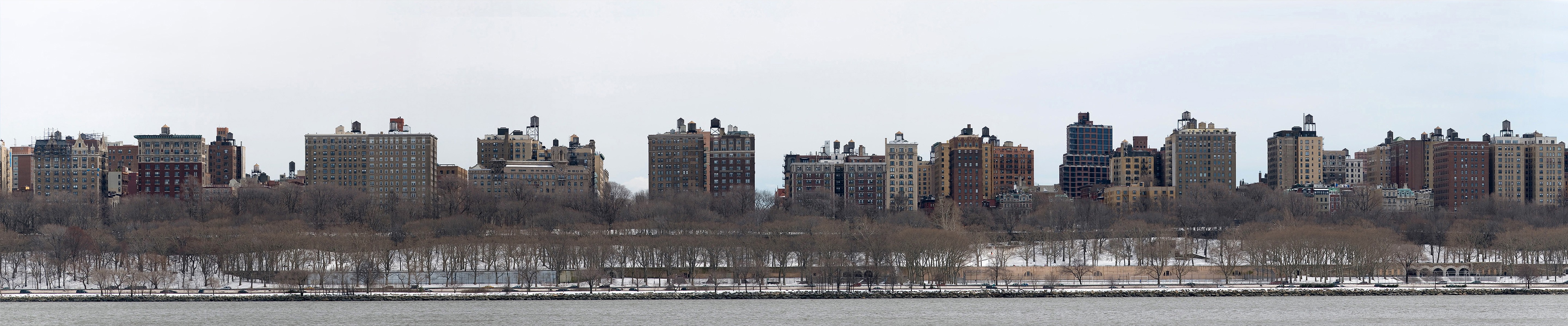 Panorama of buildings along a waterway in winter HD Wallpaper