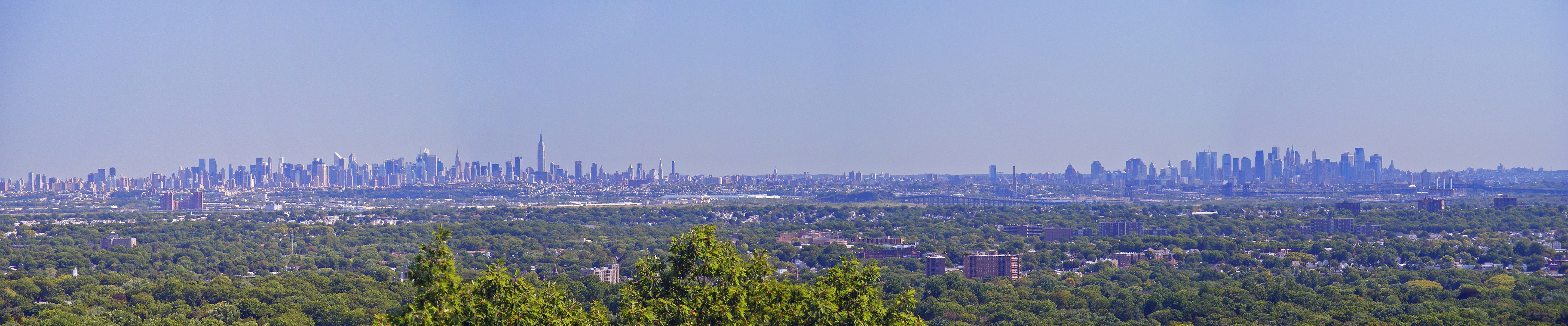 Panoramic view of New York City skyline from a distance HD Wallpaper