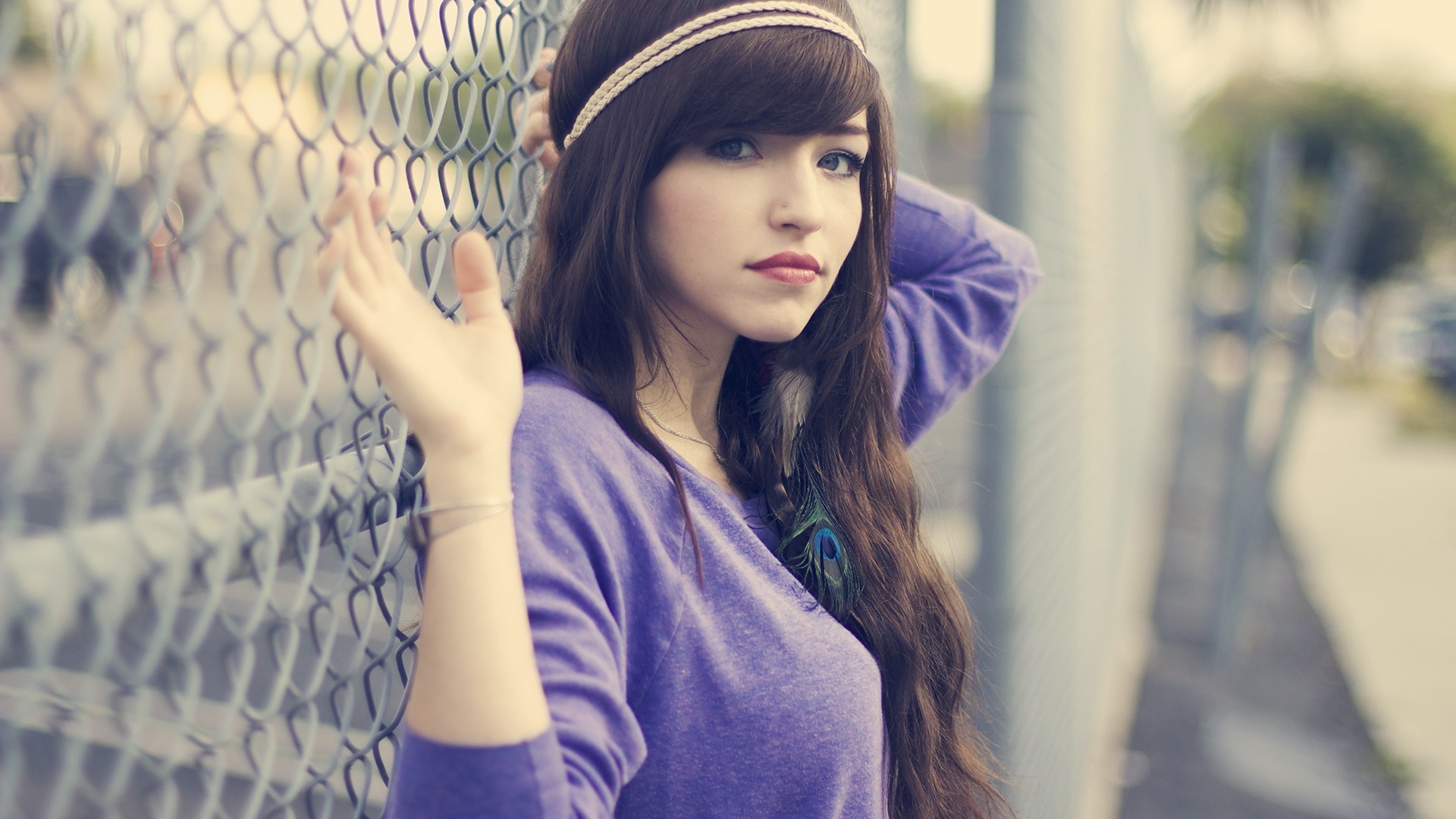 Young woman with headband and purple sweater HD Wallpaper