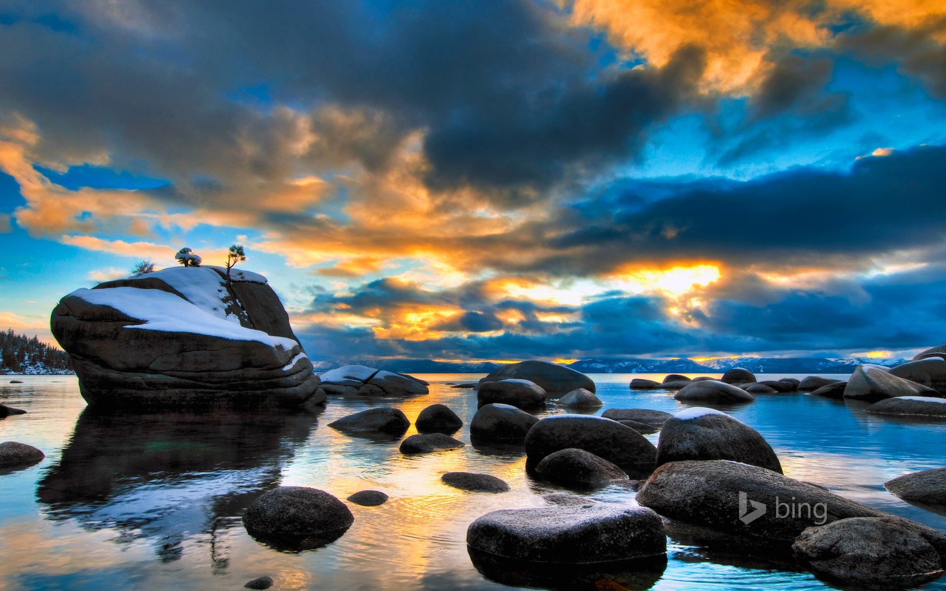Rocky Shoreline with Sunset Clouds Over Water HD Wallpaper