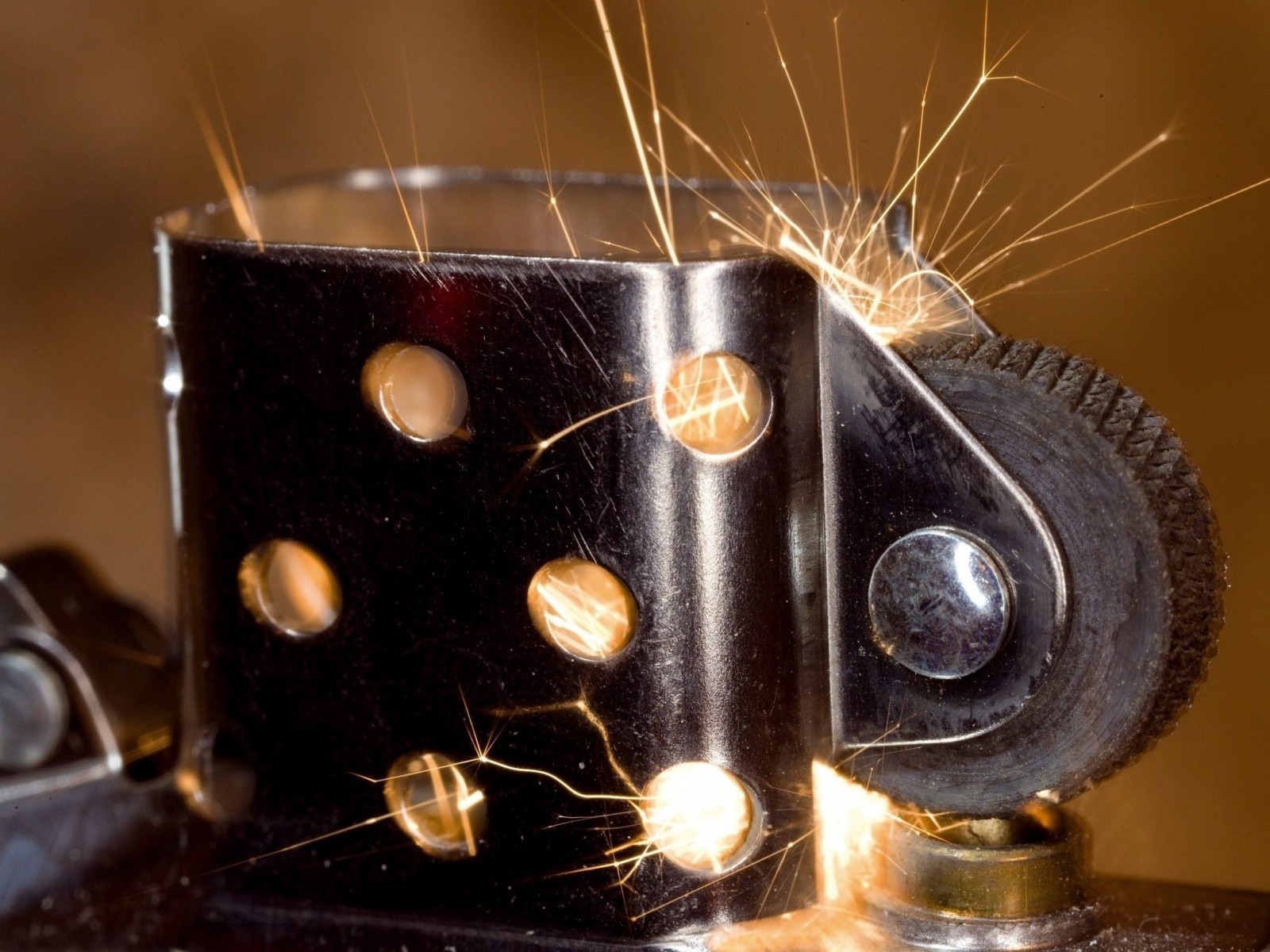 Close-up of a lighter sparking HD Wallpaper