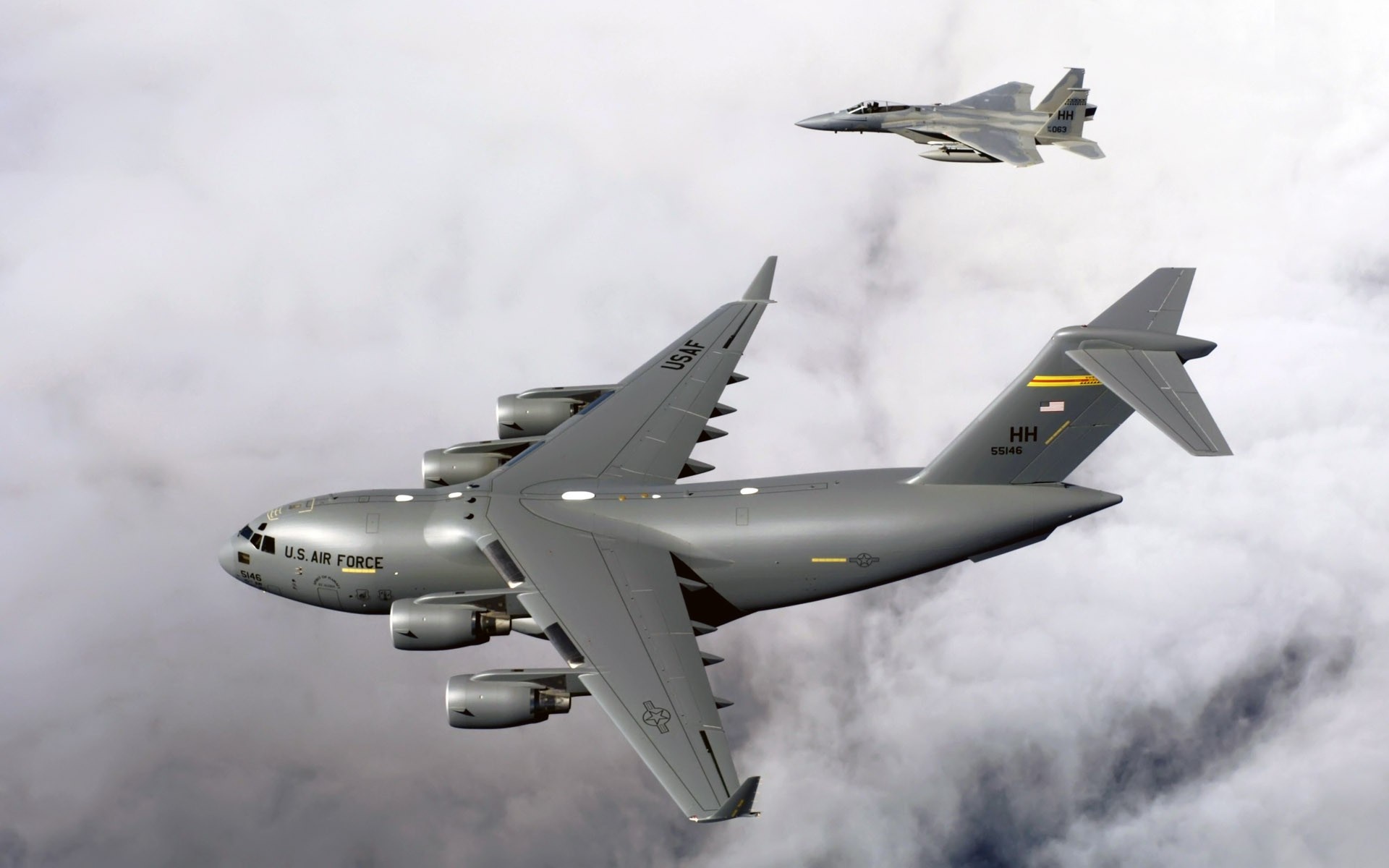 Boeing C-17 Globemaster III and F-15 Eagle in the sky HD Wallpaper