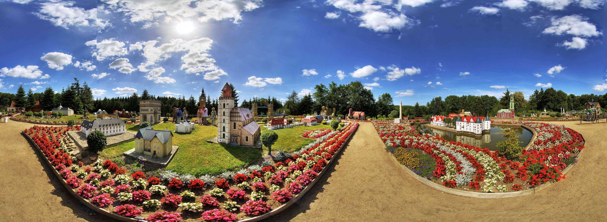 Miniature village with gardens and flowers HD Wallpaper