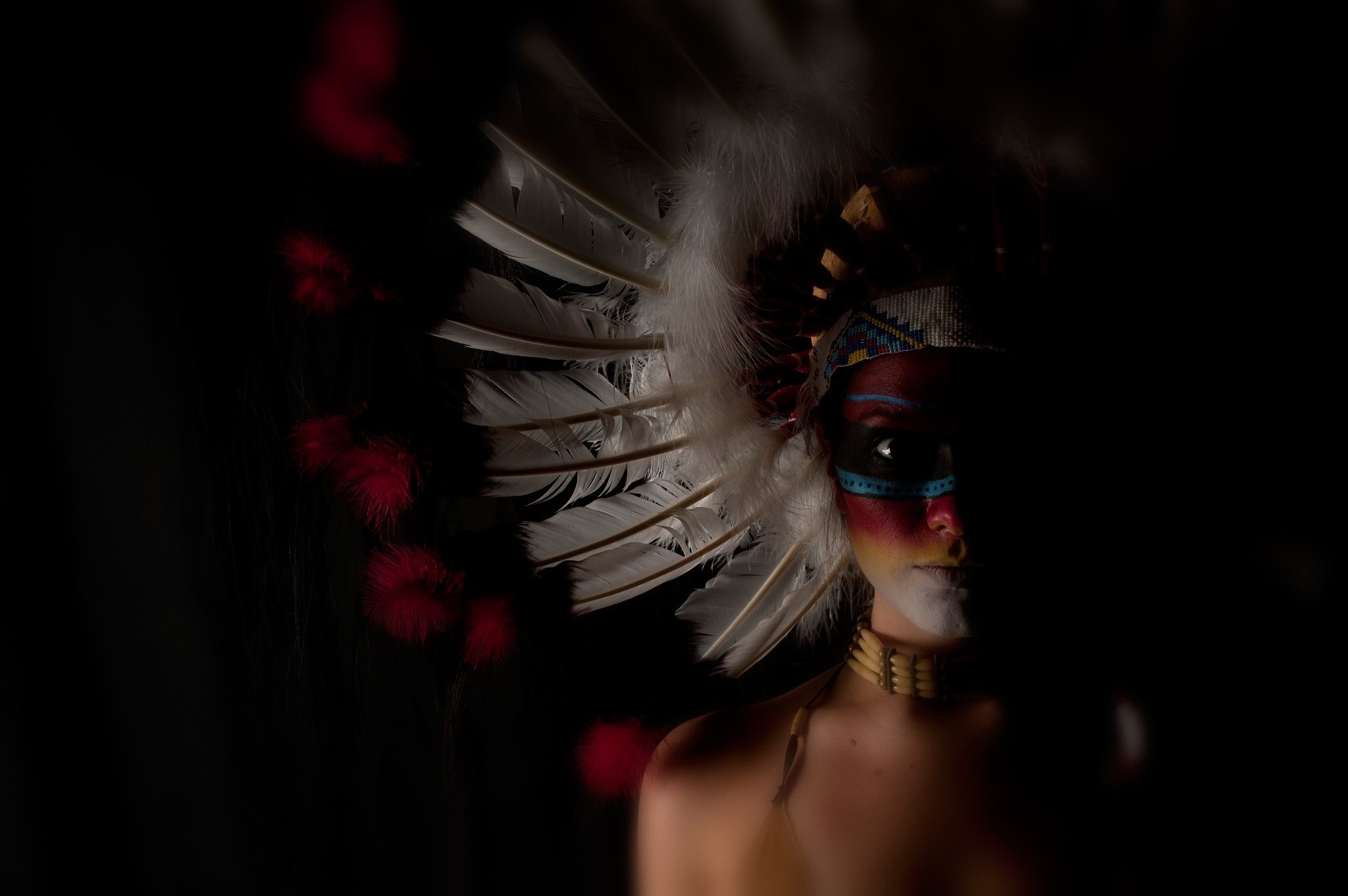 Woman with Native American Headdress and Face Paint HD Wallpaper