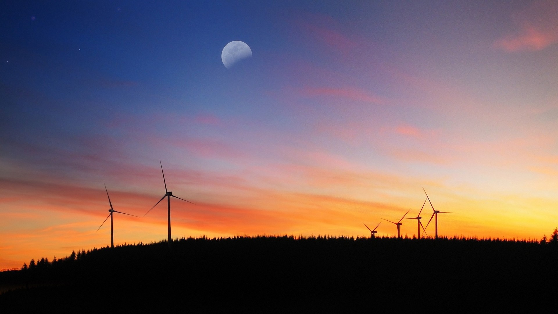 Wind turbines on a hill at sunset with moon HD Wallpaper