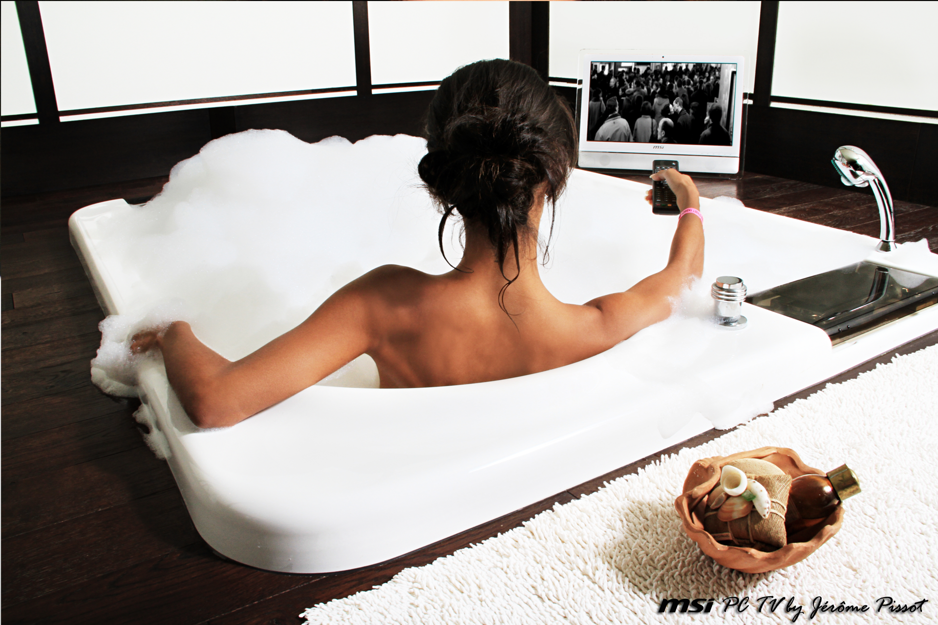 Woman in bathtub watching TV HD Wallpaper