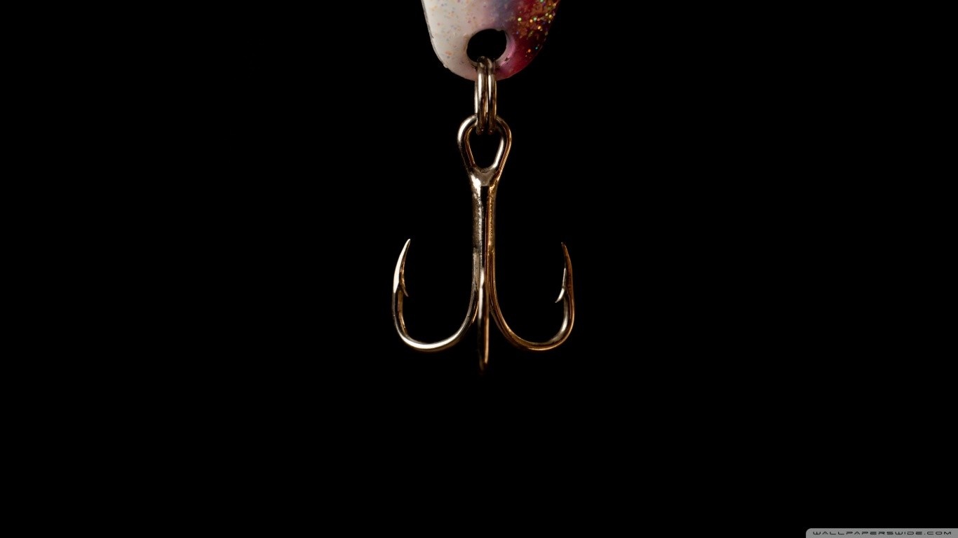 Fishing lure with treble hook on black background HD Wallpaper