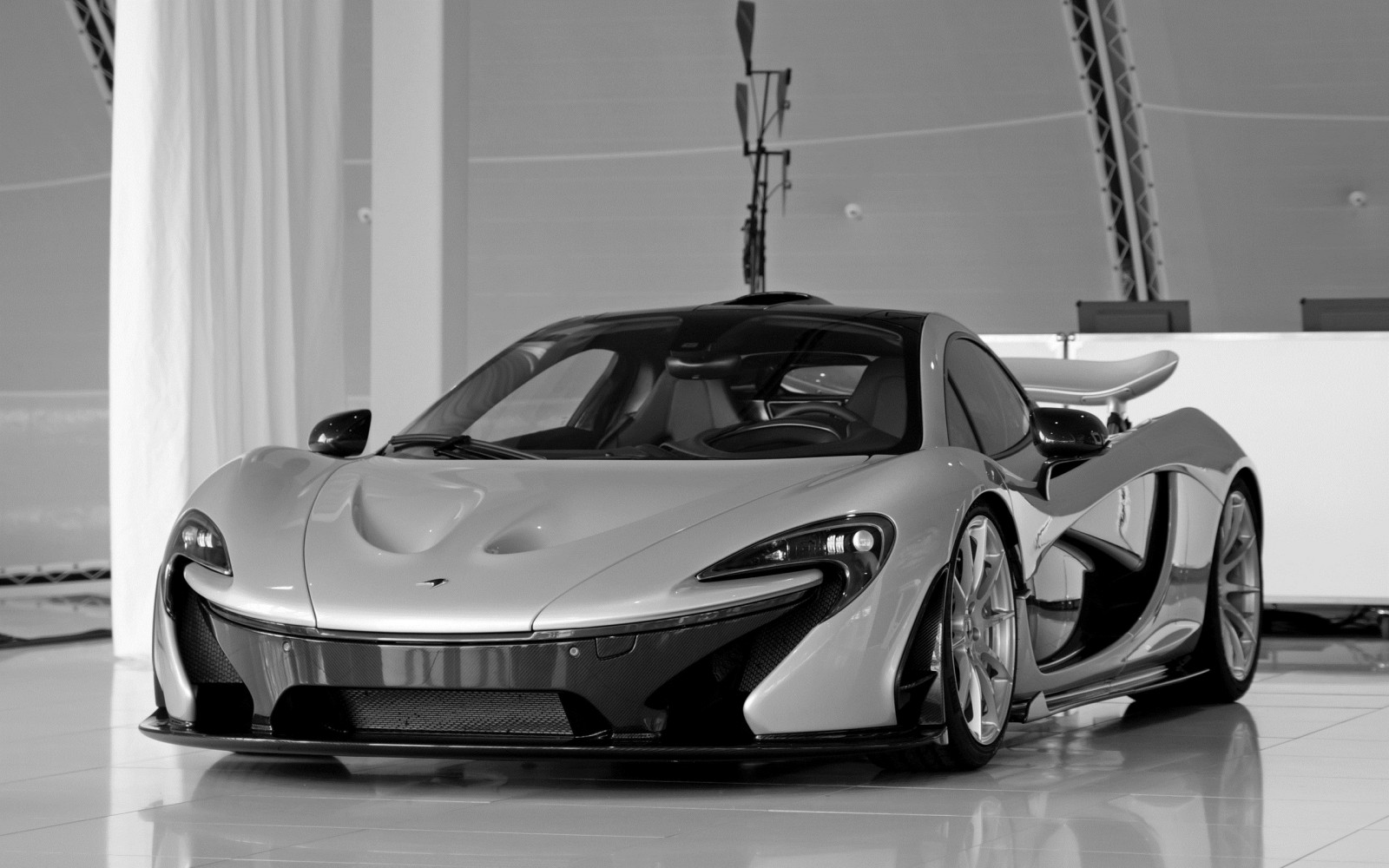 McLaren P1 supercar in a showroom HD Wallpaper