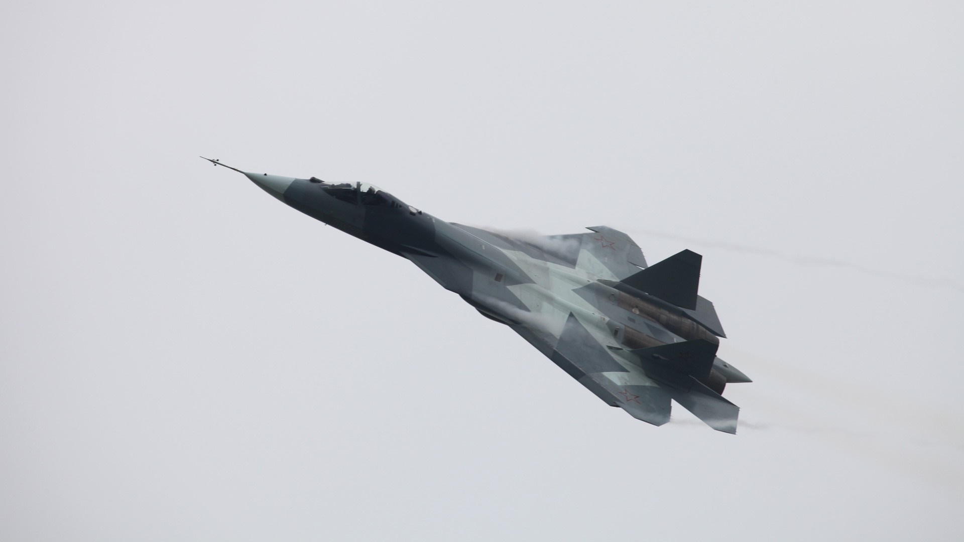 Sukhoi Su-57 fighter jet in flight HD Wallpaper
