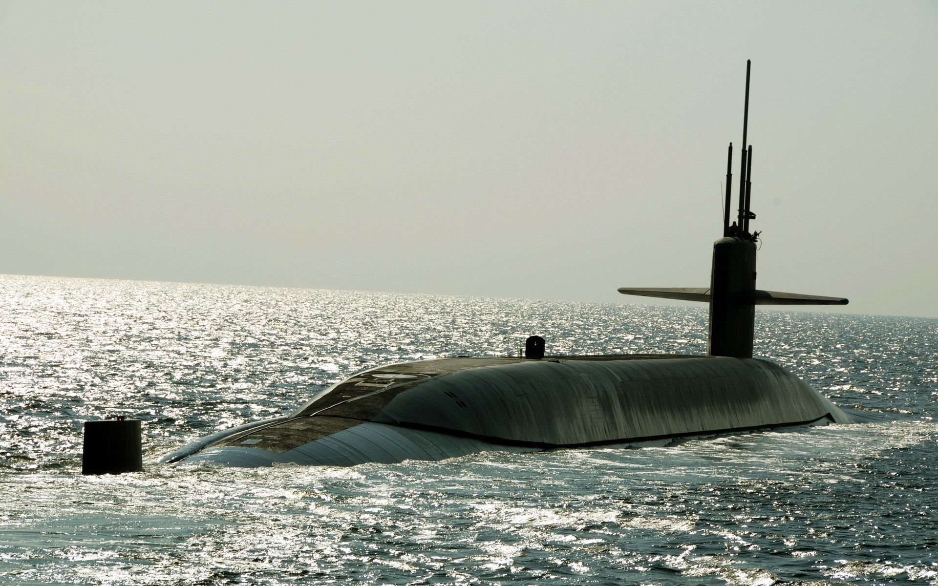 Submarine sailing on the sea HD Wallpaper