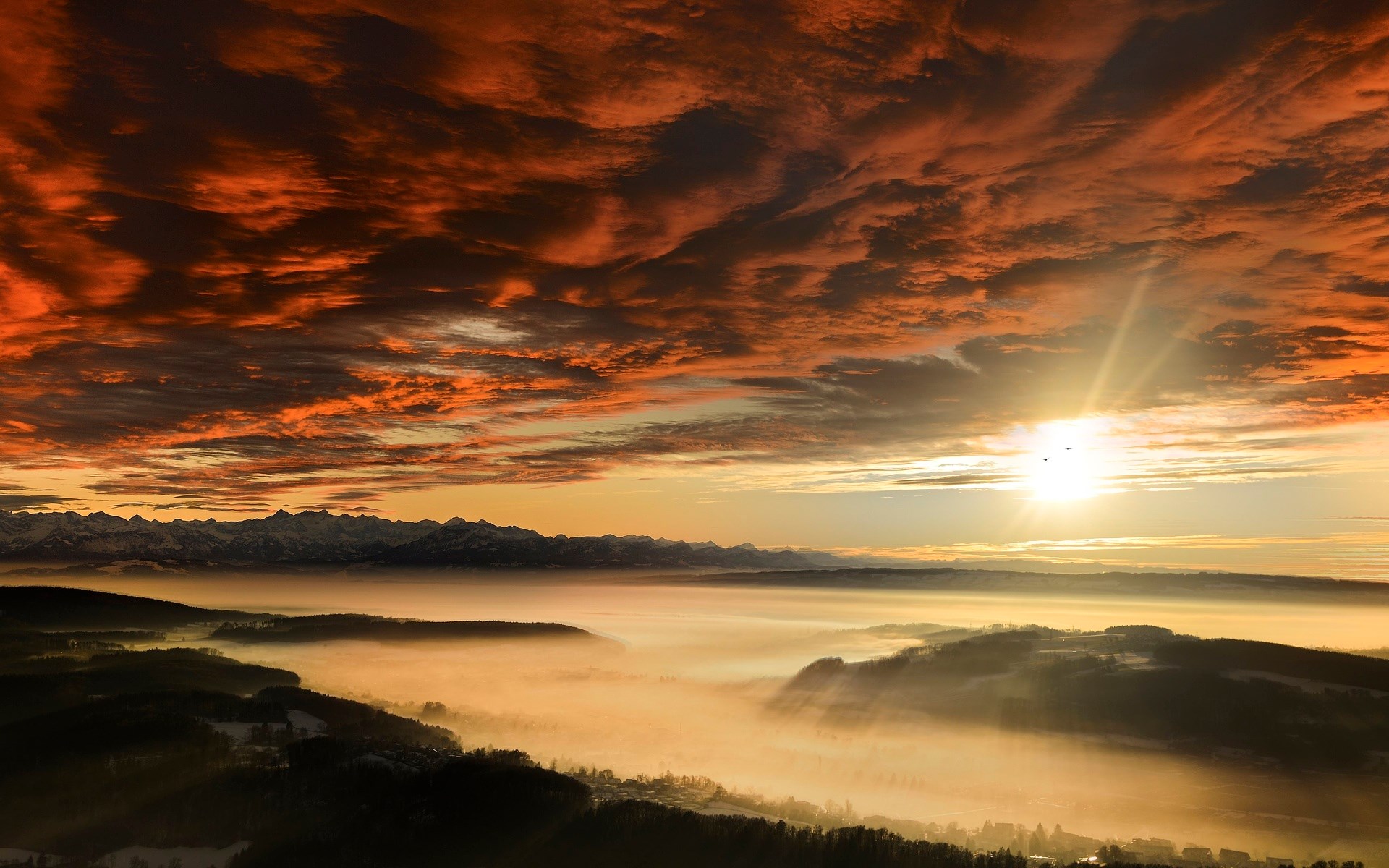 Sunset over misty mountains and valleys HD Wallpaper